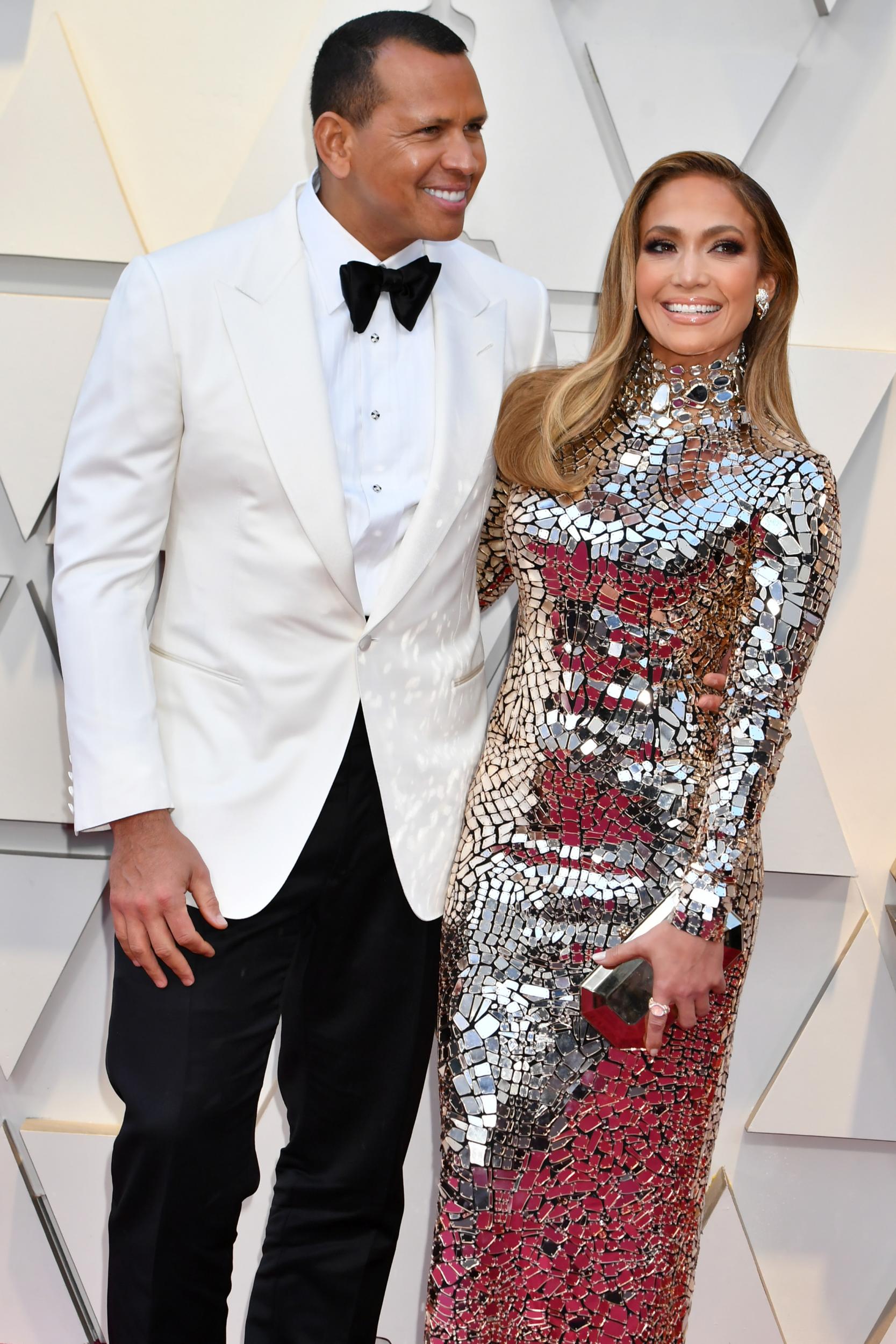 Lopez posed with her fiance, Alex Rodriguez, at the 91st Academy Awards in February 2019 wearing a Tom Ford-sleeved silver dress.