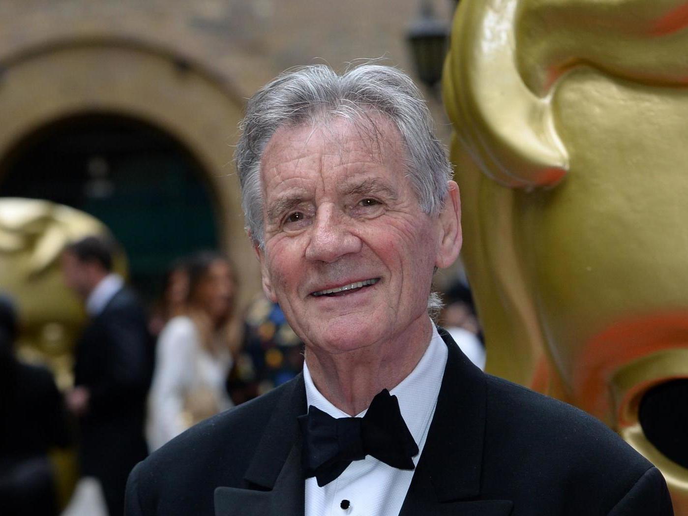 Michael Palin says he was saved by elderly neighbour after accidentally setting house on fire