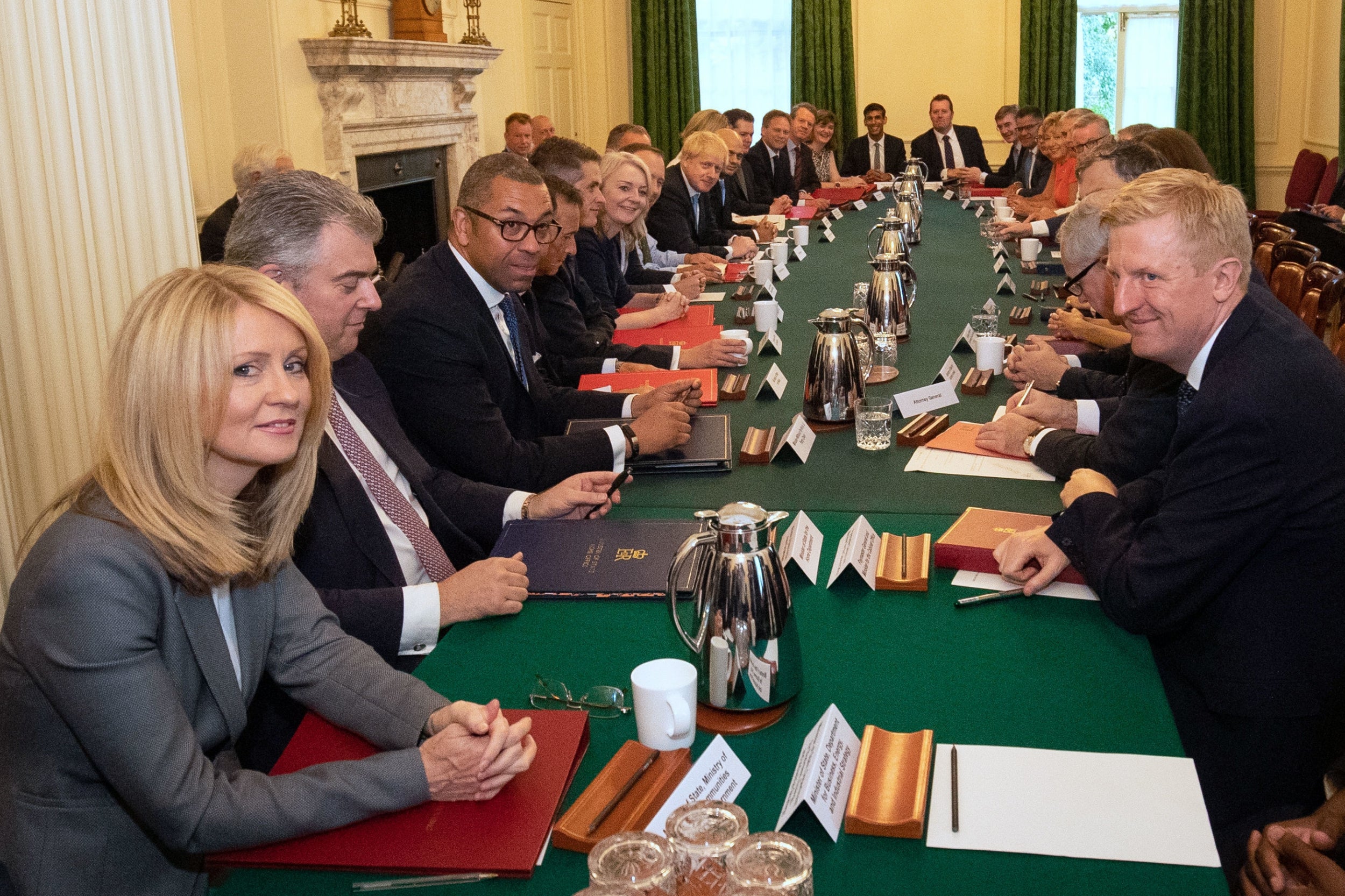 Mr Johnson’s cabinet meets for the first time, with Rishi Sunak at the far end of the table