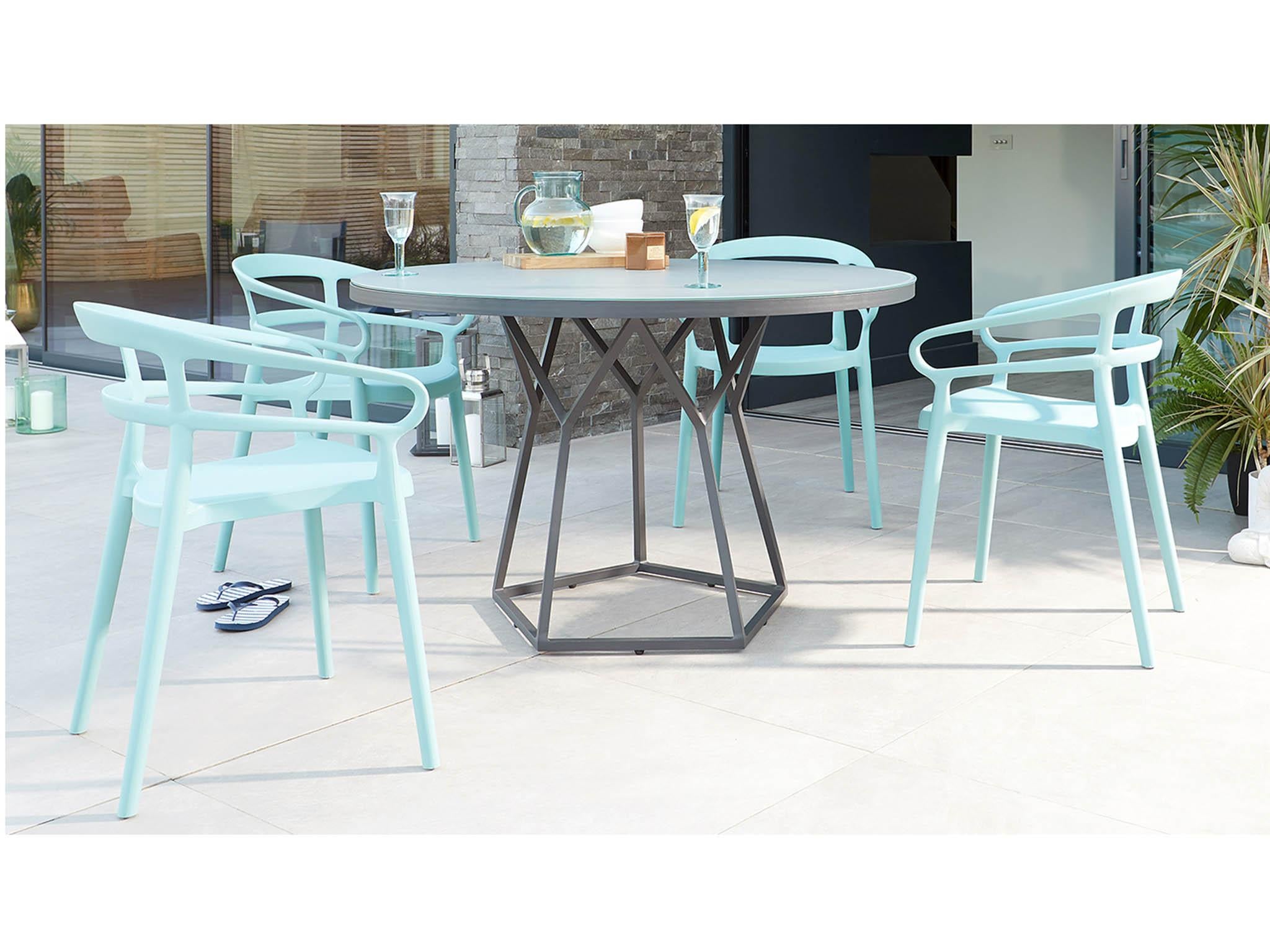 An outdoor table and chairs set doesn't have to be uninteresting or clunky, instead, upgrade to a contemporary pastel-coloured style such as this one (Danetti)