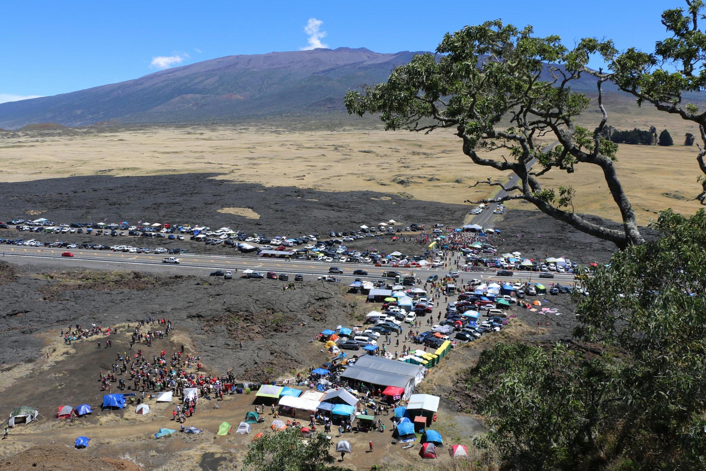 Protesters block a road to the summit of Mauna Kea in Hawaii on 21 July, 2019.