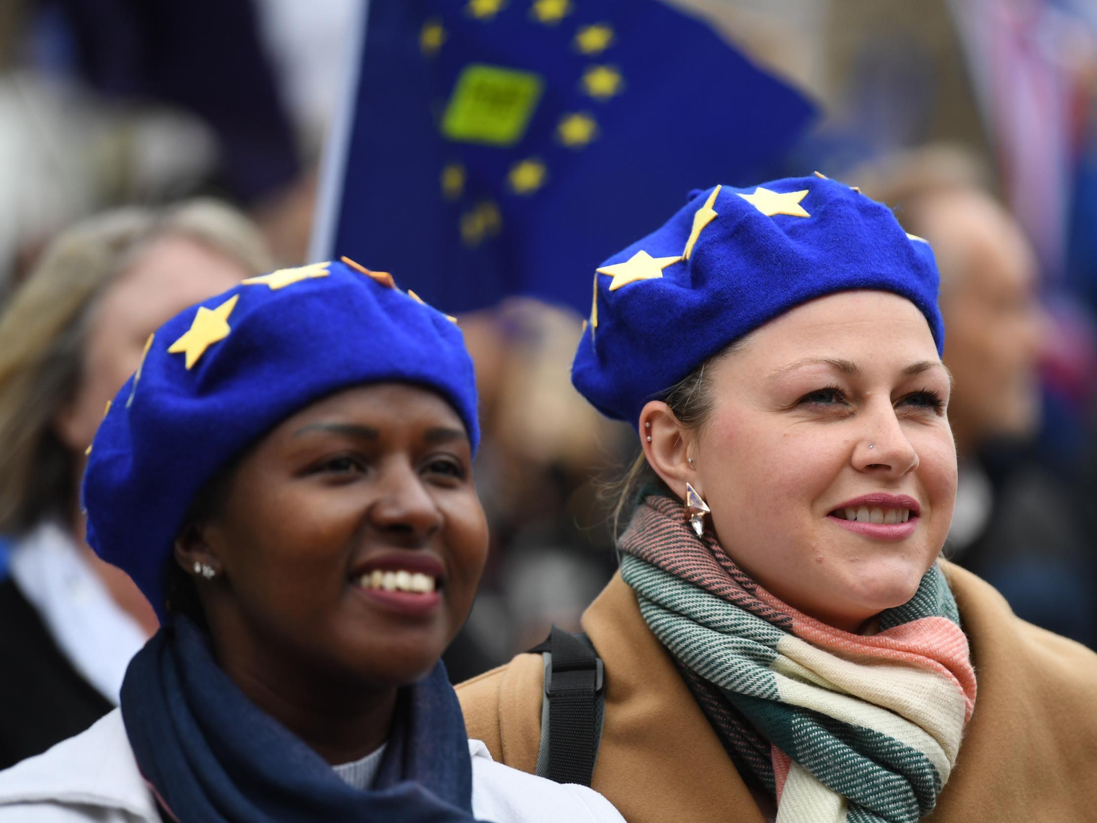 Anti-Brexit protesters march outside the Conservative Party Conference in Birmingham last year (EPA)