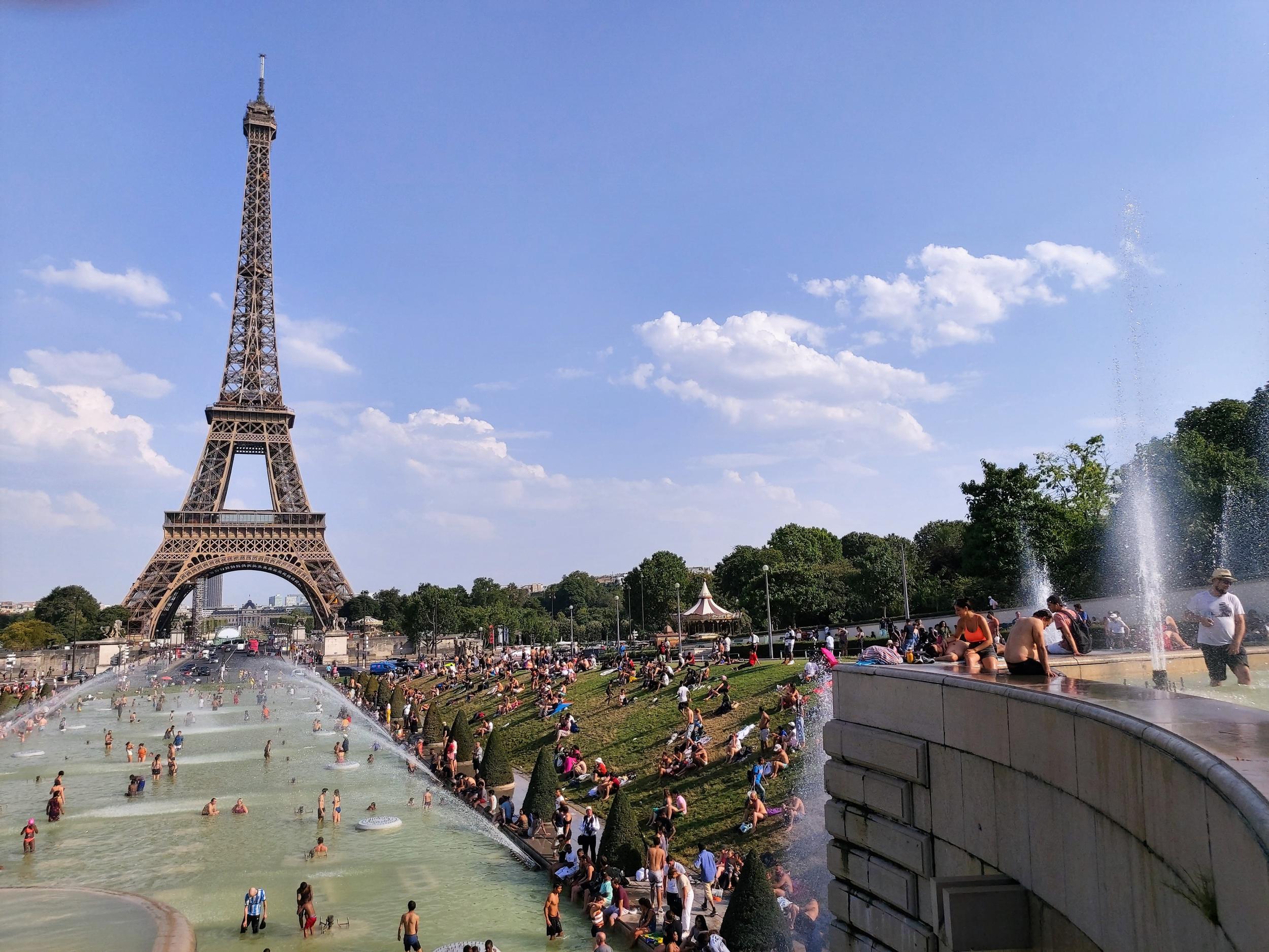 The Jardins du Trocadero became an oasis for Parisians and tourists on the hottest day in the city's history. The previous record temperature in Paris was 40.4C, set in 1947