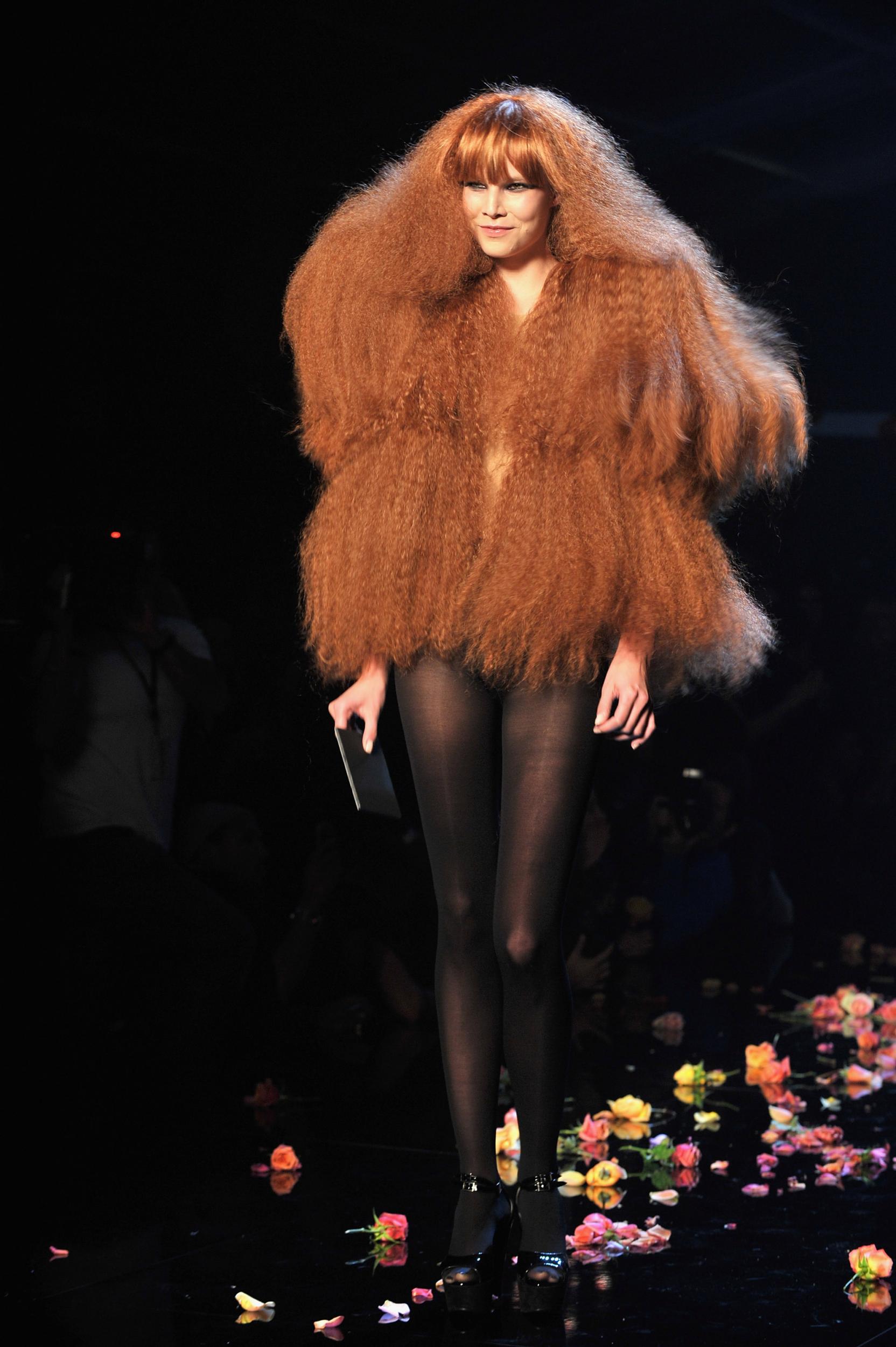 During the Sonia Rykiel spring/summer show at Paris Fashion Week in 2008, the brand celebrated its 40th birthday and paid homage to Rykiel’s famous style. One model walked the runway in an oversized red crimped wig that cascaded past her hips. British fashion journalist Susannah Frankel described the designer’s hair in <i>AnOther Magazine</i> that year: 'Her instantly recognisable and quintessentially French flame-haired, alabaster-skinned, dramatically dressed appearance has captured the imagination of artists including Andy Warhol, Giacometti and Jean Cocteau.'