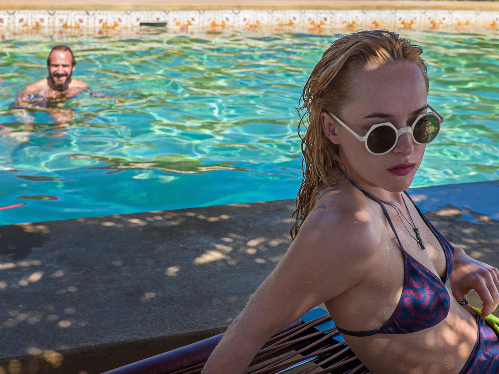 Dakota Johnson and Ralph Fiennes in A Bigger Splash