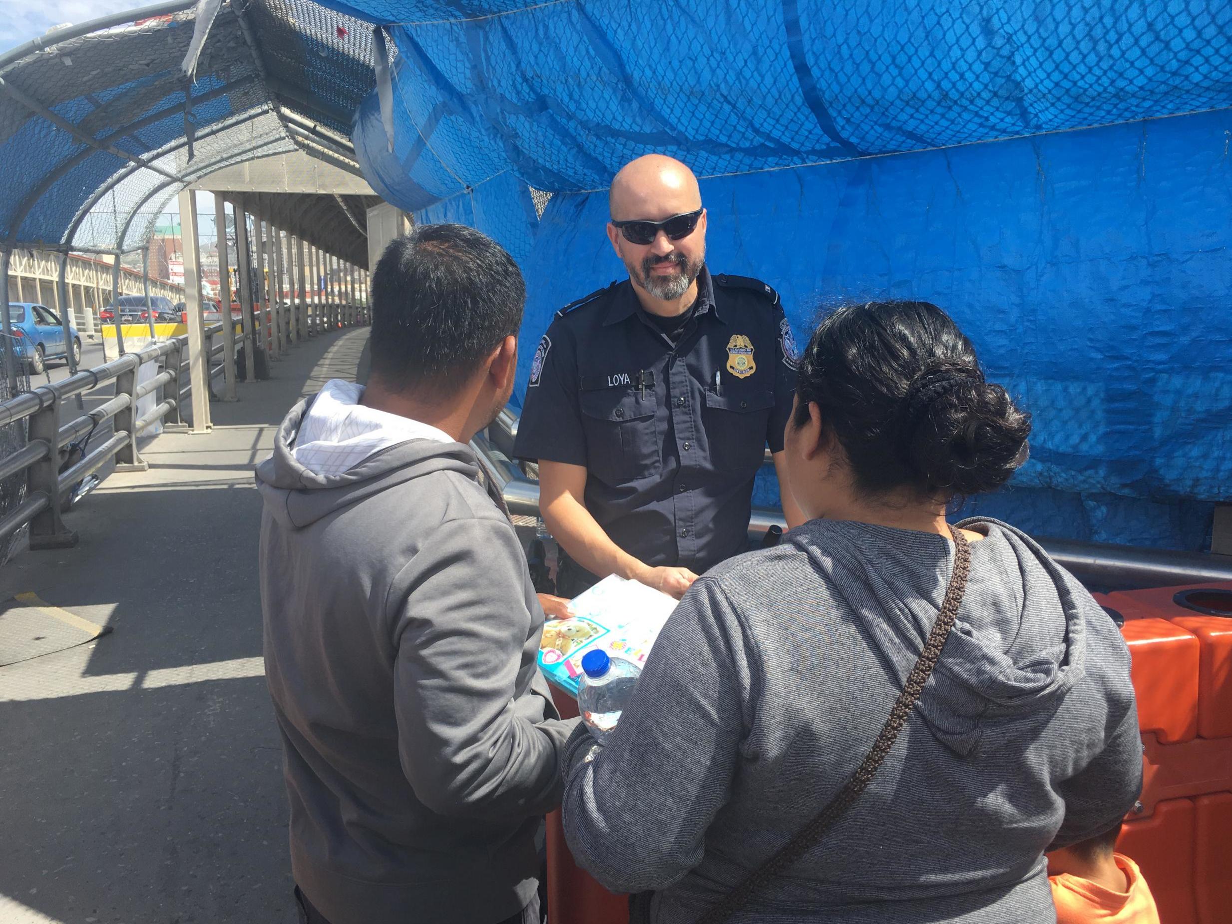 Ron Wyden helped a family of asylum seekers (pictured) to enter the United States during a visit to the border