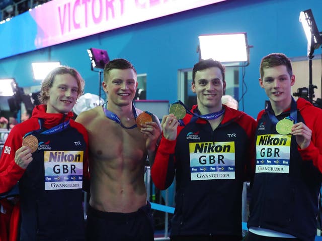 Luke Greenbank, Adam Peaty, James Guy and Duncan Scott pose