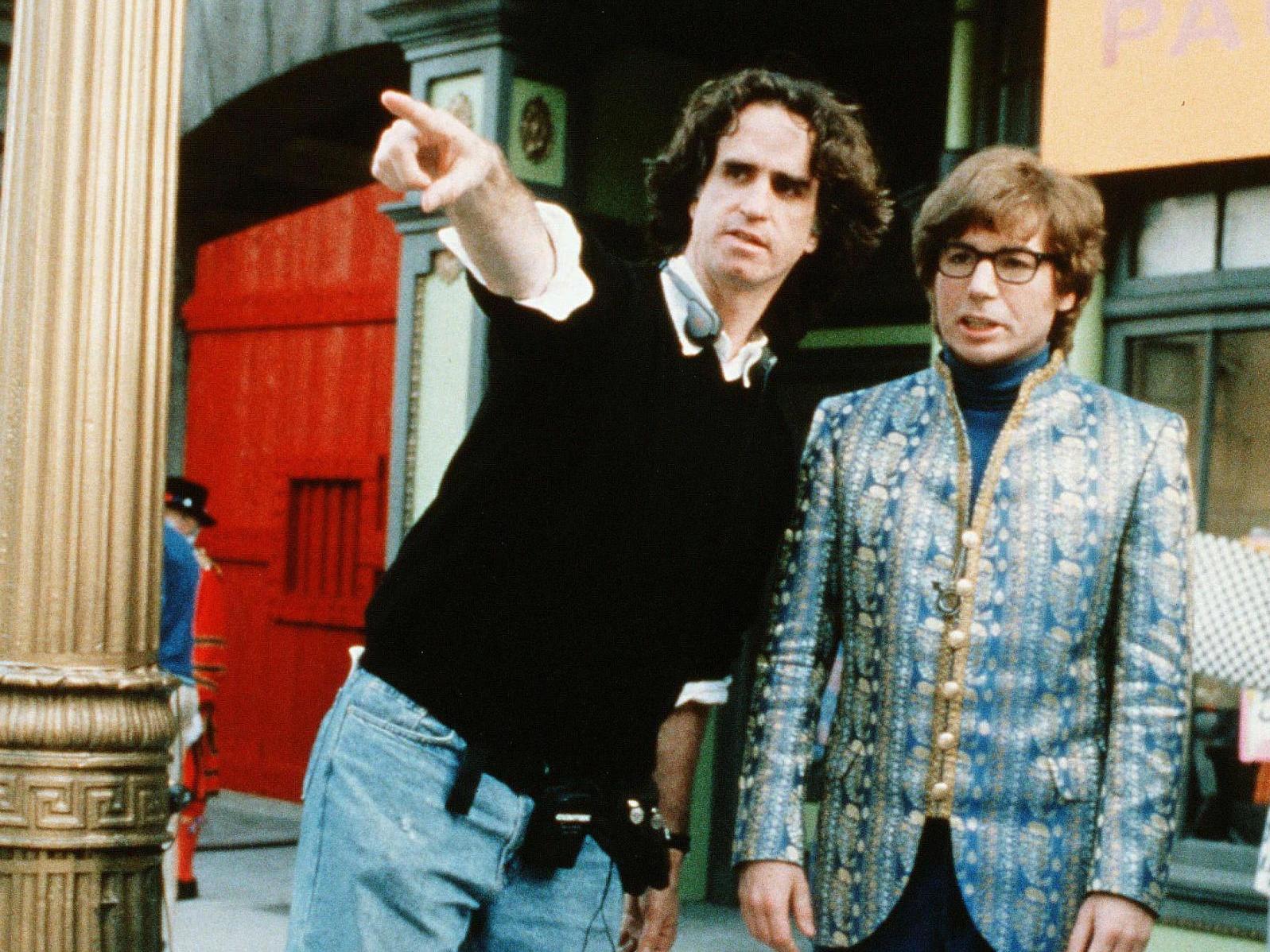 Jay Roach and Mike Myers on the film’s set in 1999 (Rex)