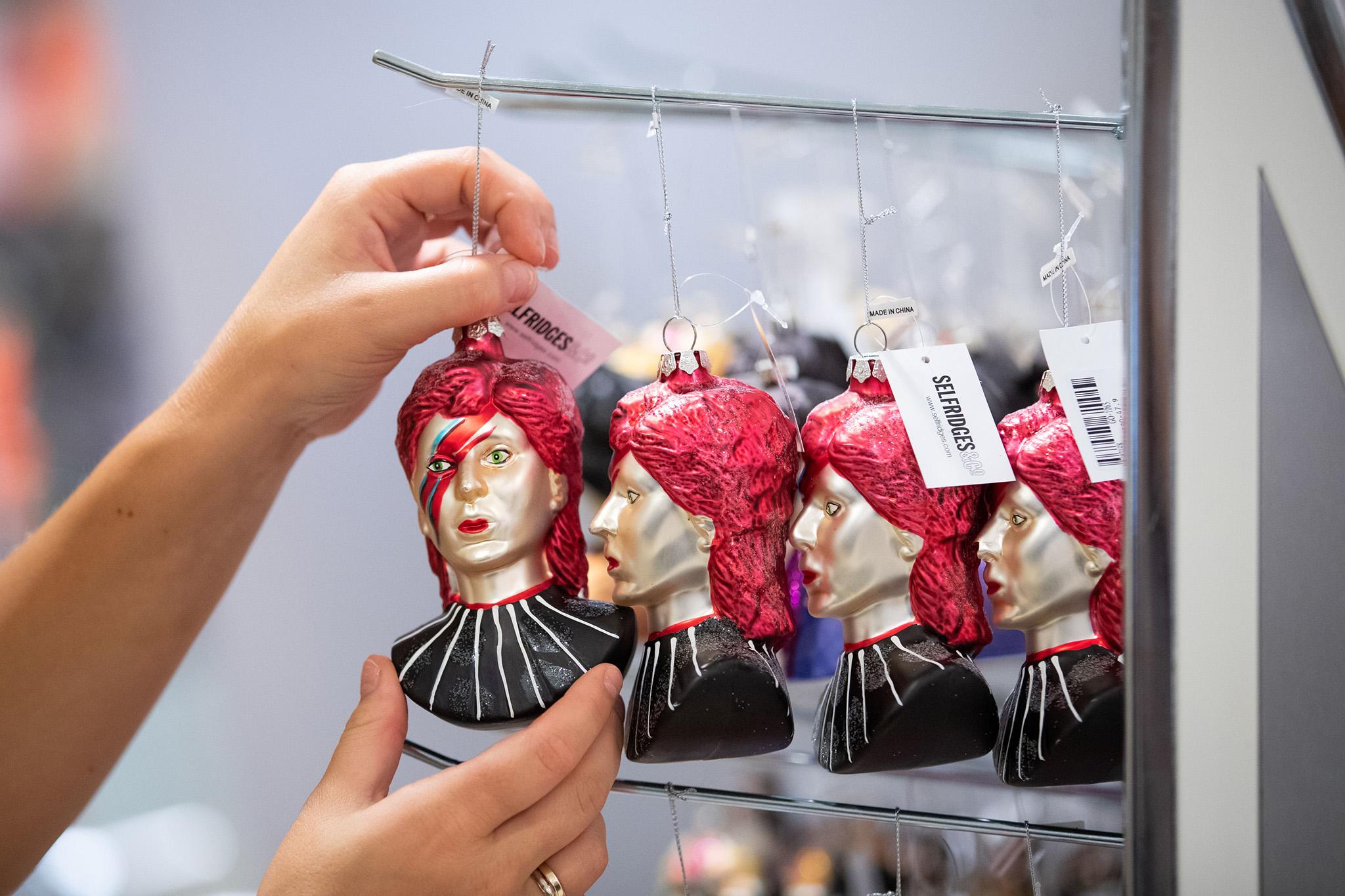 David Bowie themed Christmas tree decorations for sale as part of the seasonal Christmas range in the Selfridges Christmas shop in London on July 29