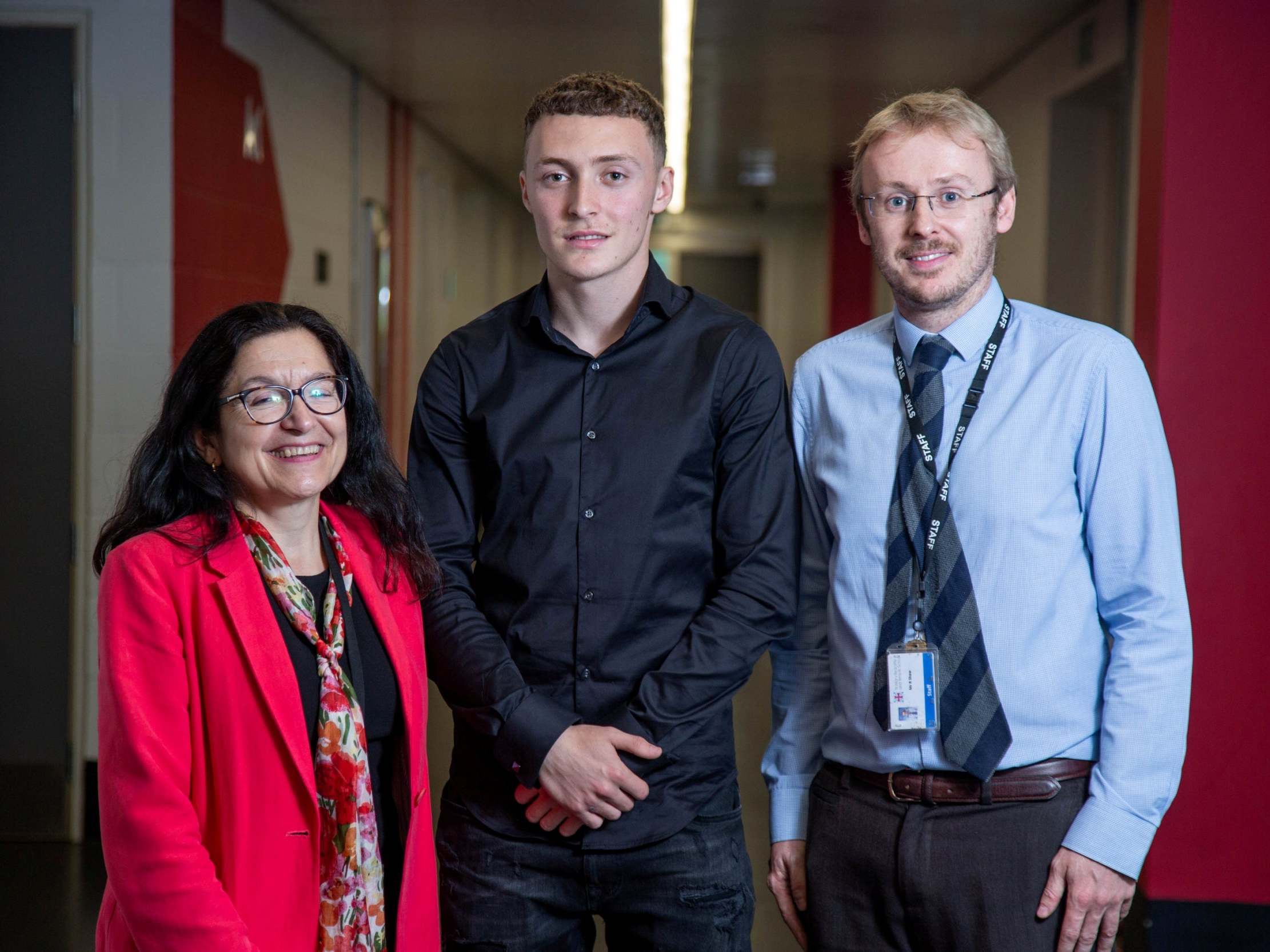 Headteacher Elisabeth Gilpin and teacher Rob Shaw with Stiven