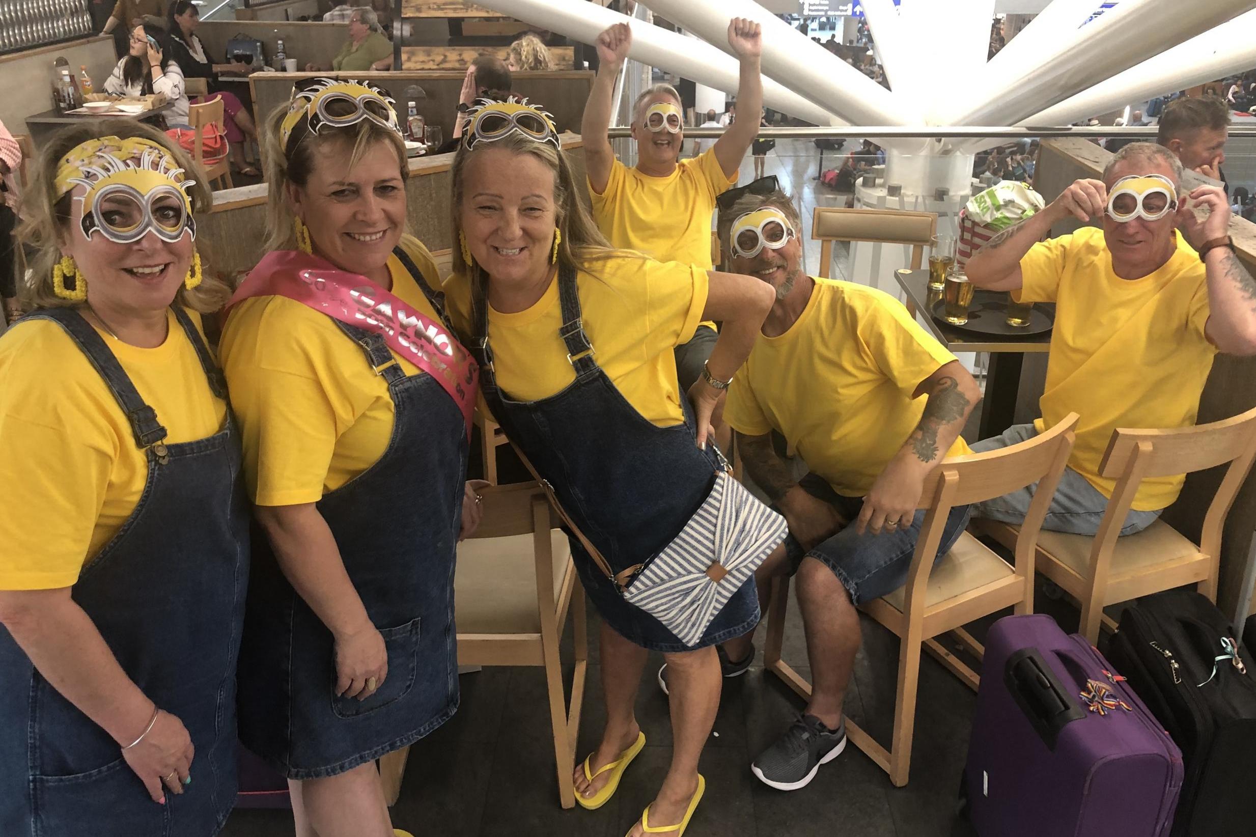 Undeterred: holidaymakers at Bristol airport, heading for Benidorm