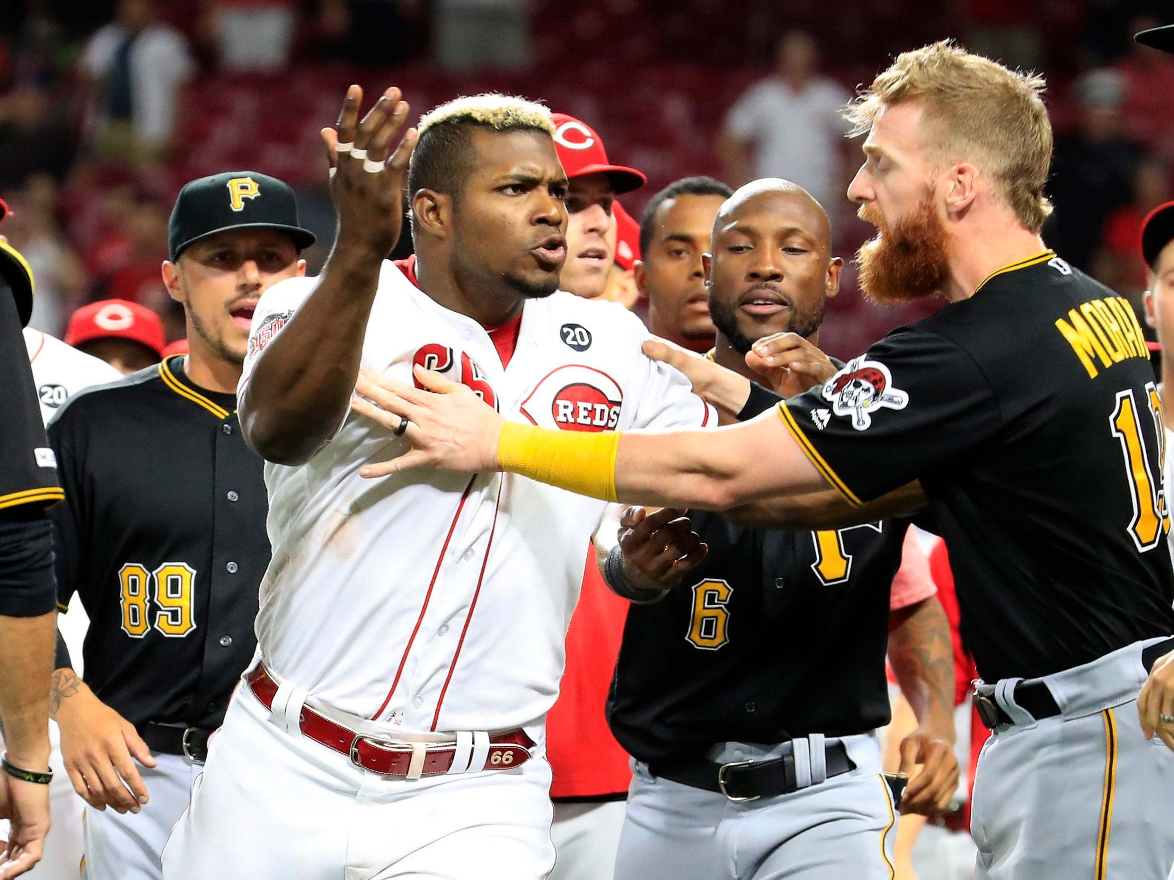 Yasiel Puig intervenes in the melee