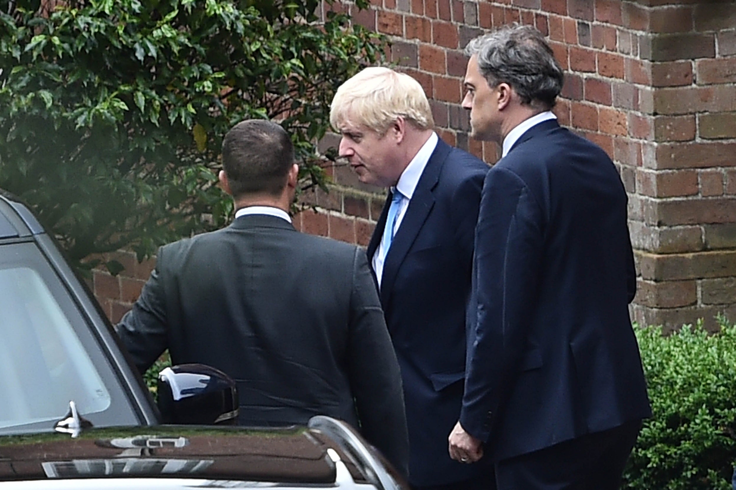 The PM and Julian Smith, the Northern Ireland secretary, leave Stormont after talks (Getty)