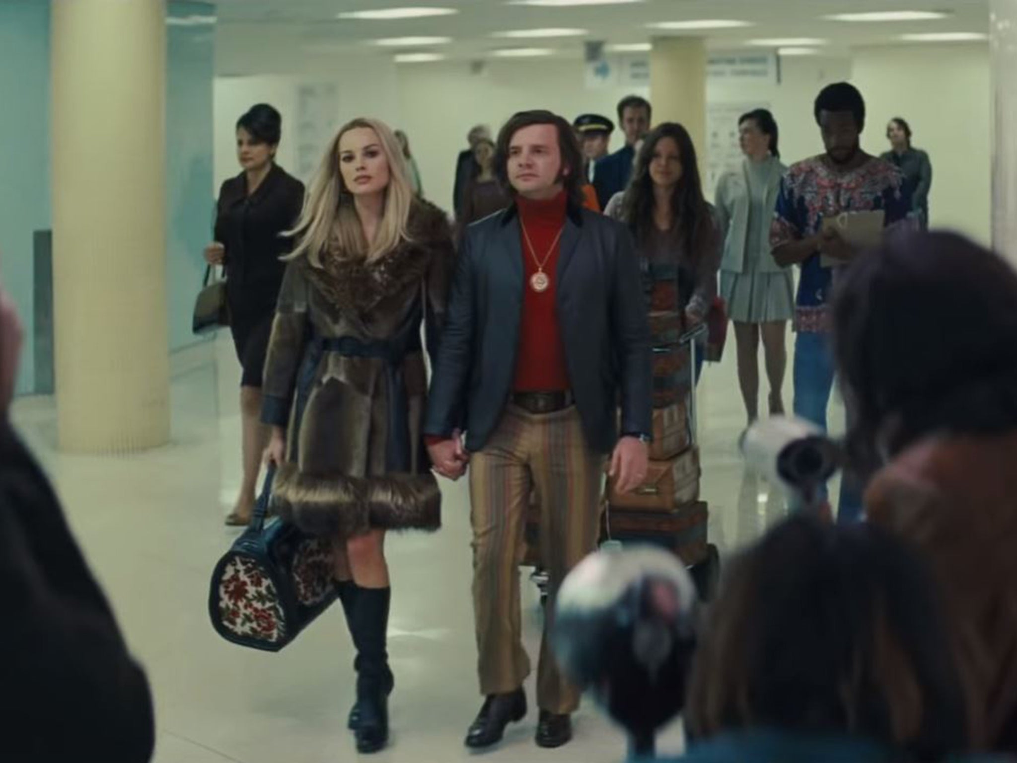 Rafał Zawierucha as Roman Polanski and Margot Robbie as Sharon Tate in Tarantino’s new feature