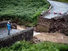 UK weather: Army called in after flash floods wash away bridges and swamp homes amid downpours