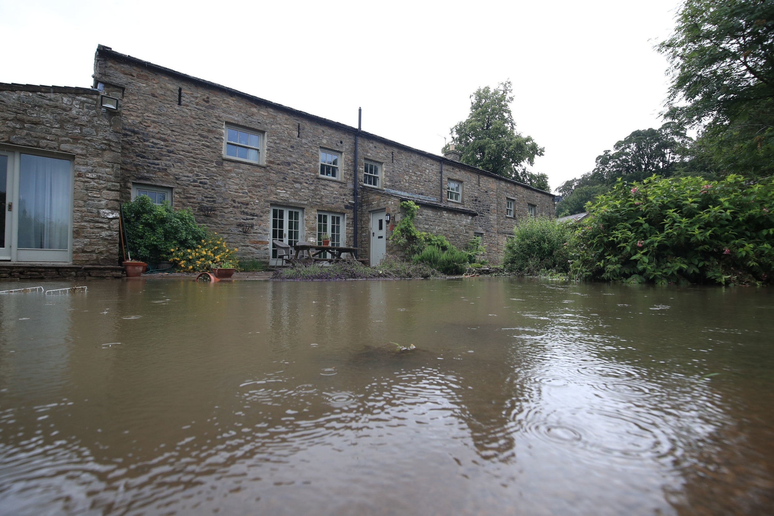 A flooded house in North Yorkshire, where more than 100 homes have been swamped