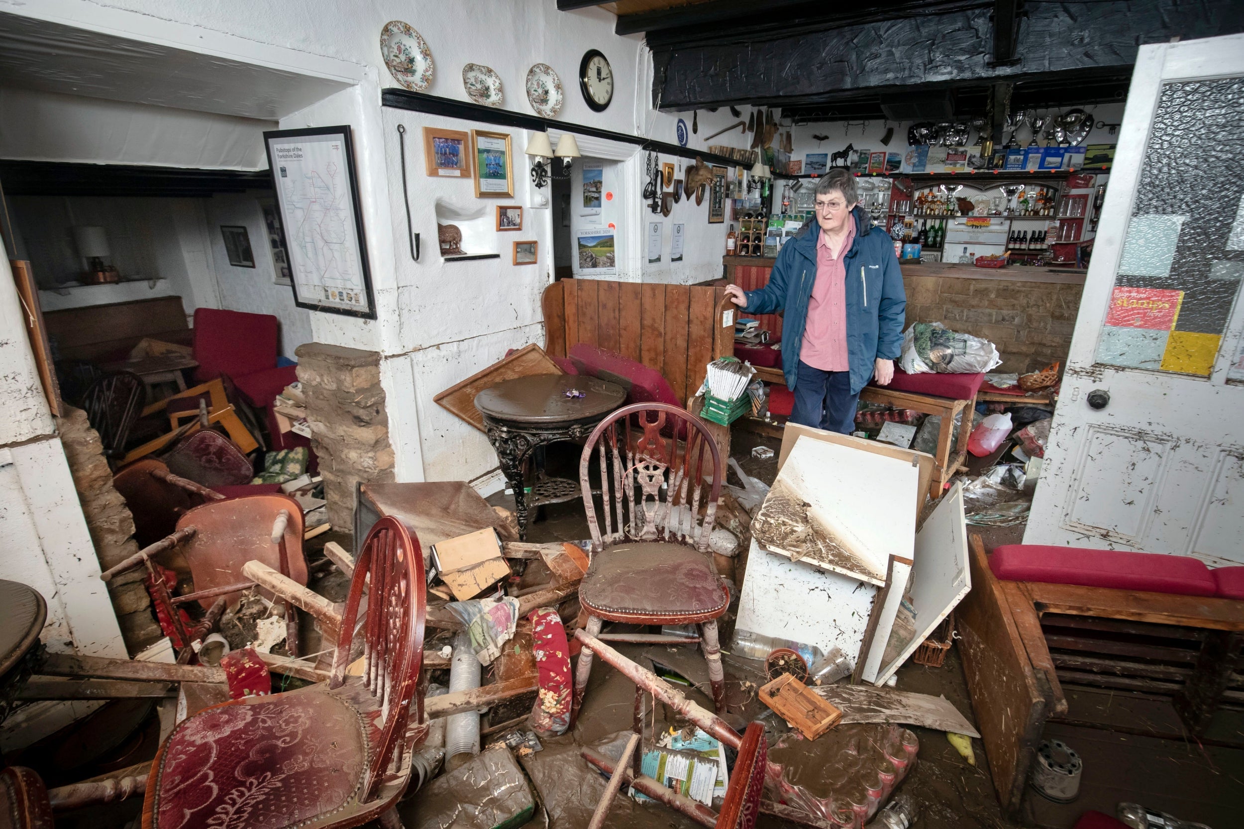 Rowena Hutchinson in her pub, the Red Lion Inn, which was devastated by flooding in Langthwaite, North Yorkshire