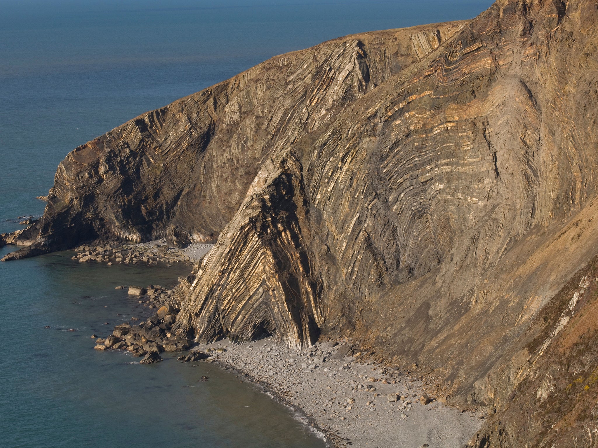 Sheer rock walls plunge into the Irish Sea at Cemaes Head, part of the Pembrokeshire Coastal Path