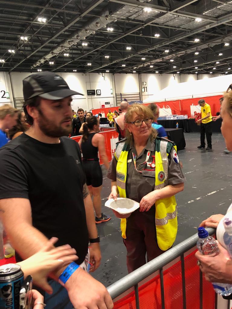 Andrew at the finish line, unfortunately – if fittingly – next to the official sick bowl