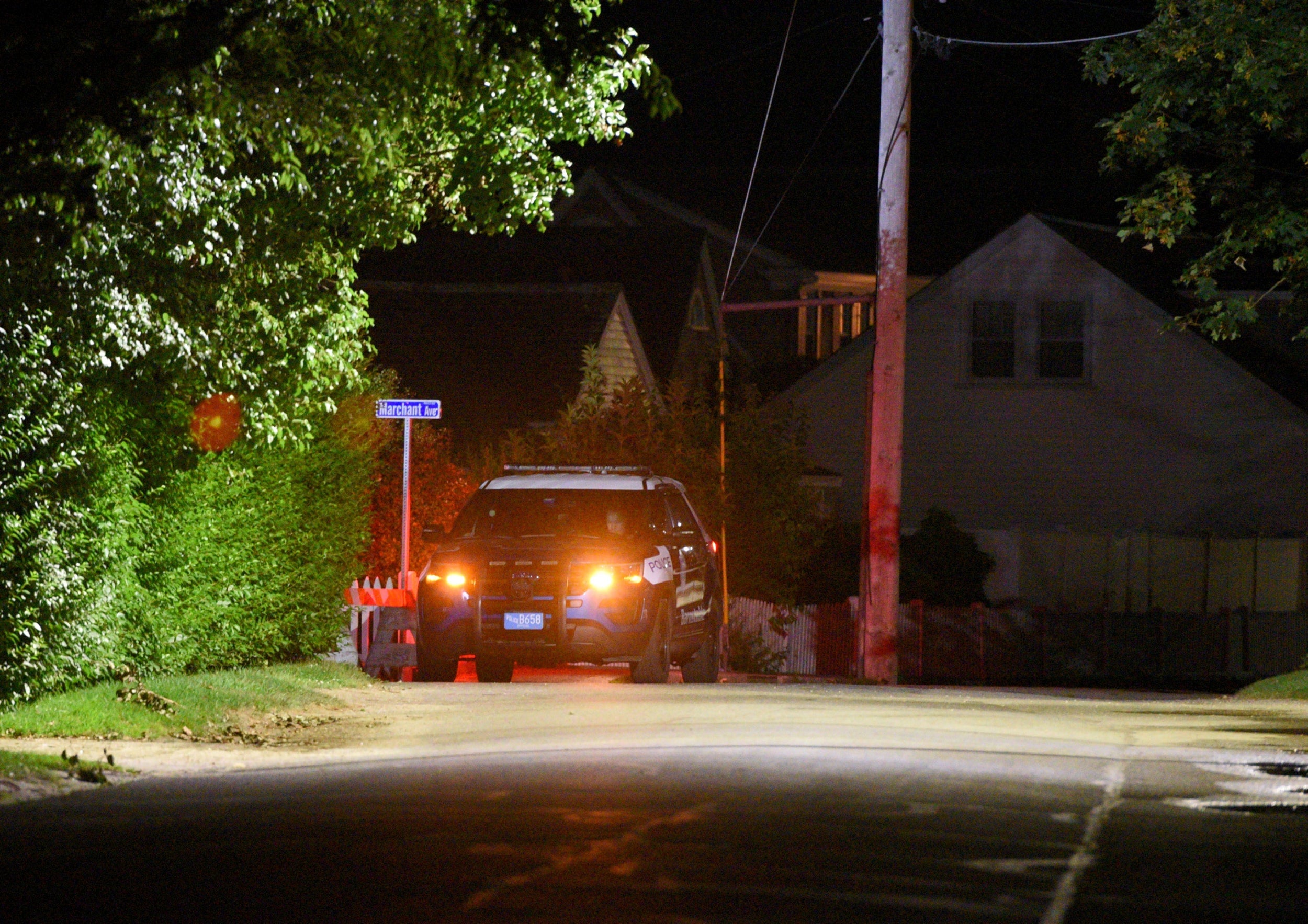 A Barnstable Police cruiser sits at the top of Marchant Avenue as police investigate Saoirse Kennedy Hill’s death