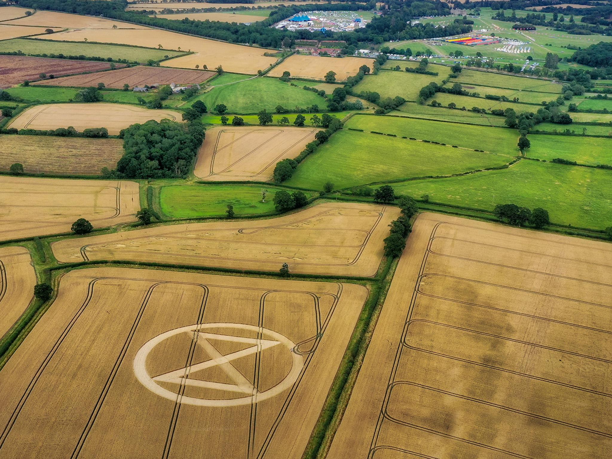 &#13;
The crop circle created by Extinction Rebellion near the site of the Womad festival in Wiltshire &#13;