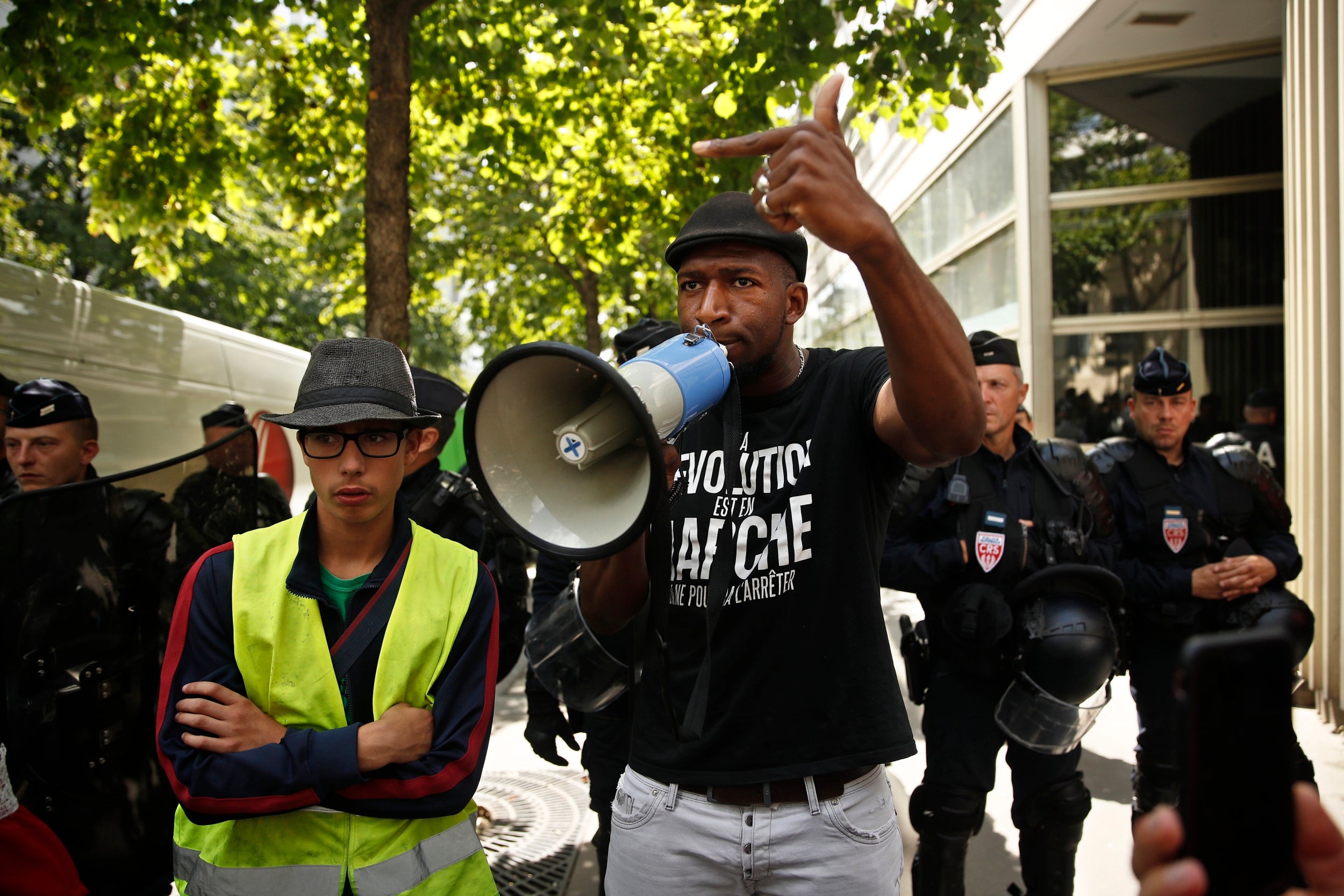 People gather by the French Police authorities in Paris to pay tribute to Steve Maia Canico, who died near Nantes