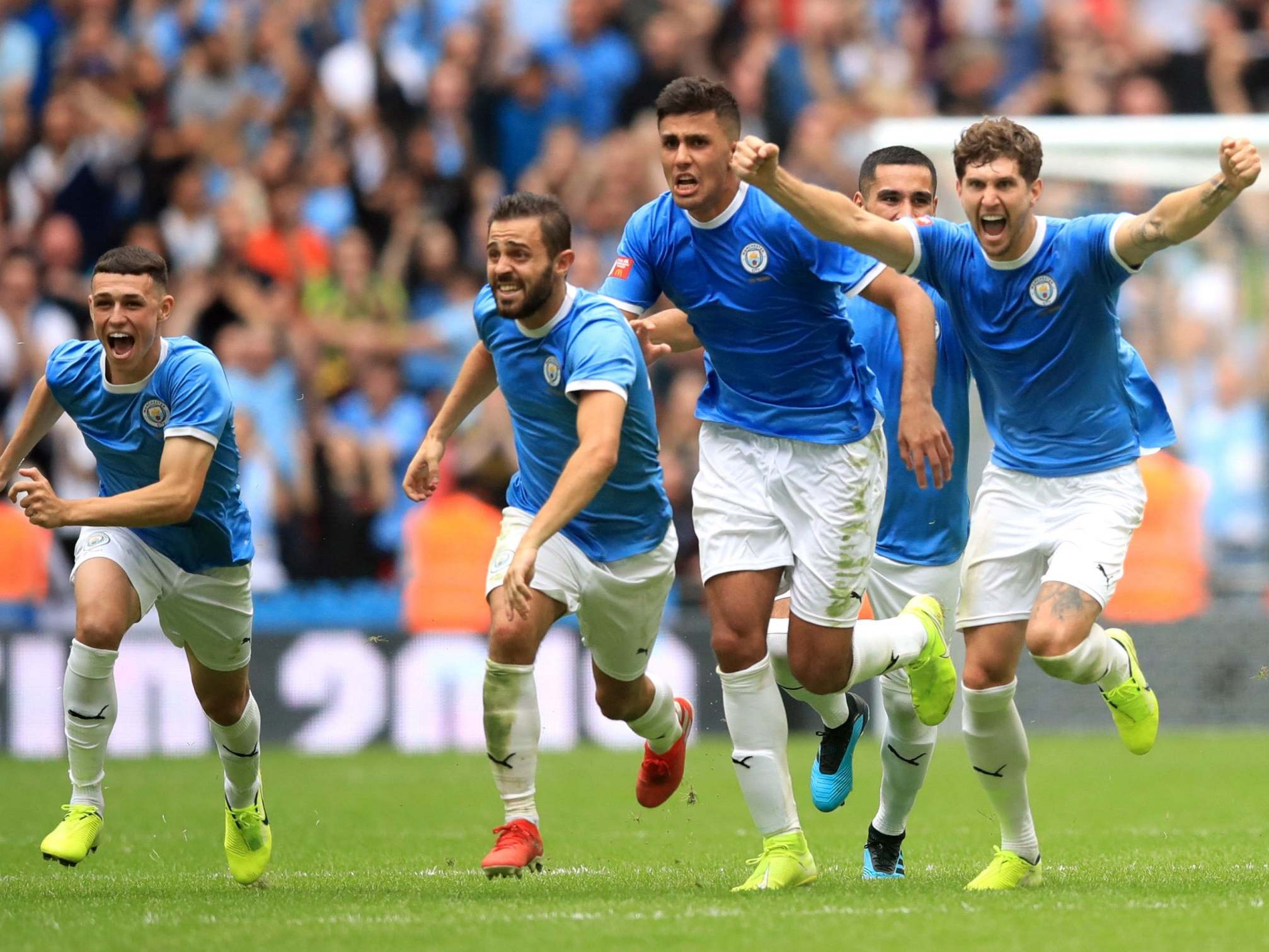 Man City celebrate winning the Community Shield