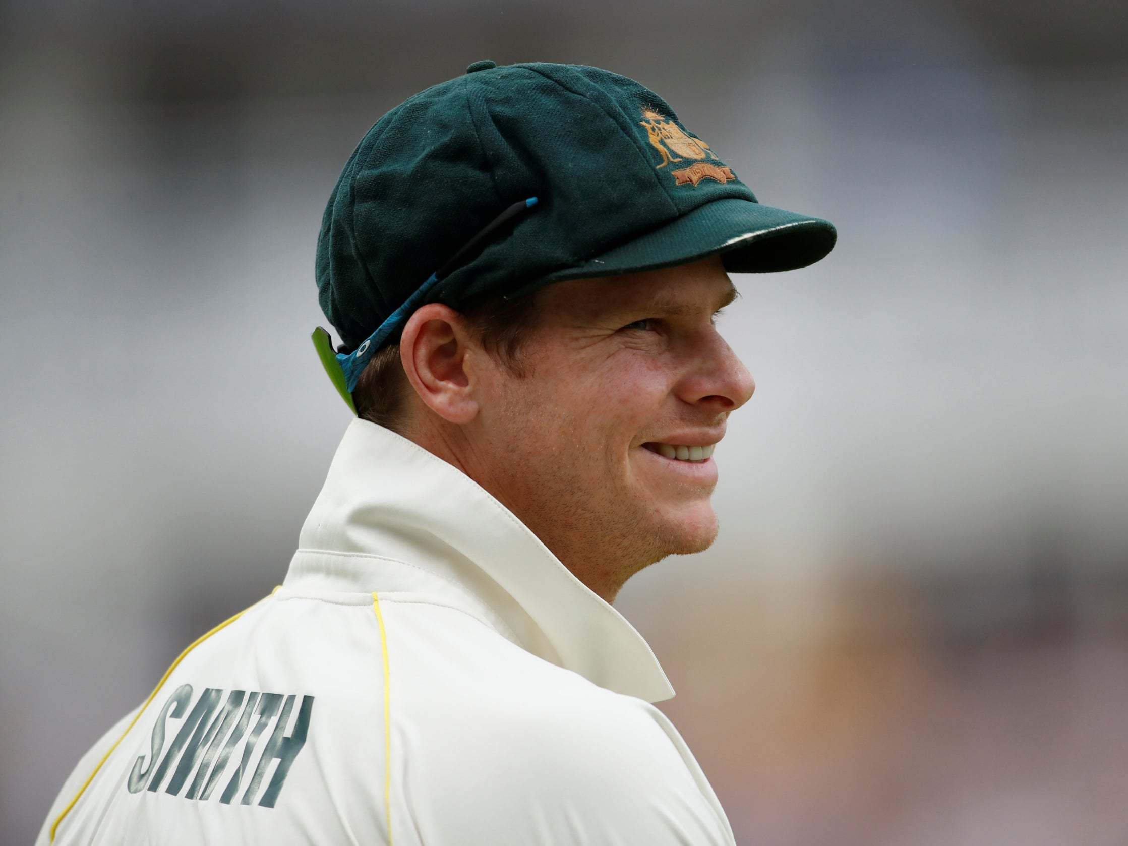 Steve Smith smiles in the field after turning the match on its head