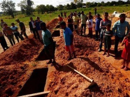 The funeral of 10 land activists killed in 2017 when police arrived at a Santa Lucia farm in Pau D’Arco, Brazil