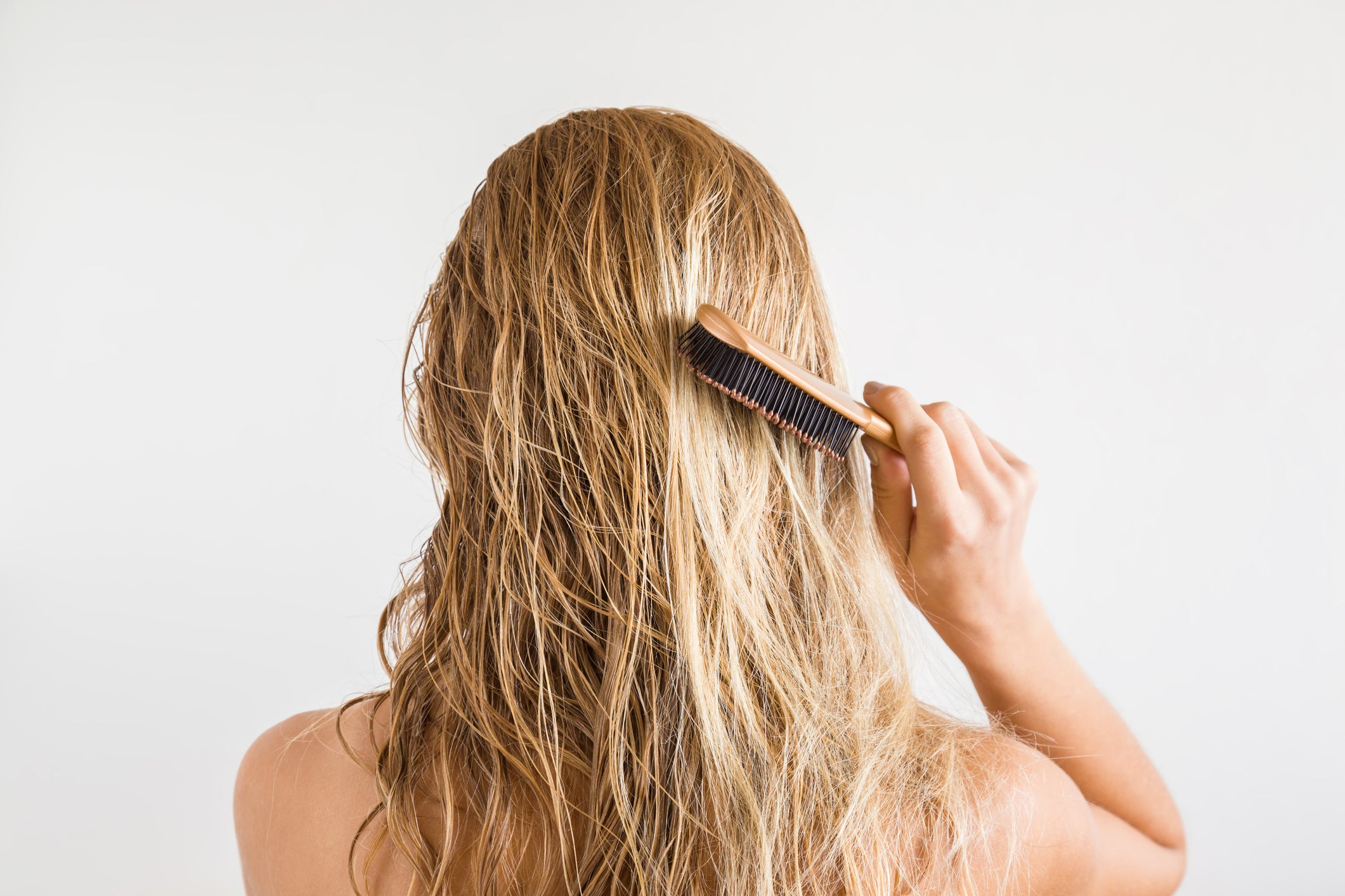 Woman brushing hair