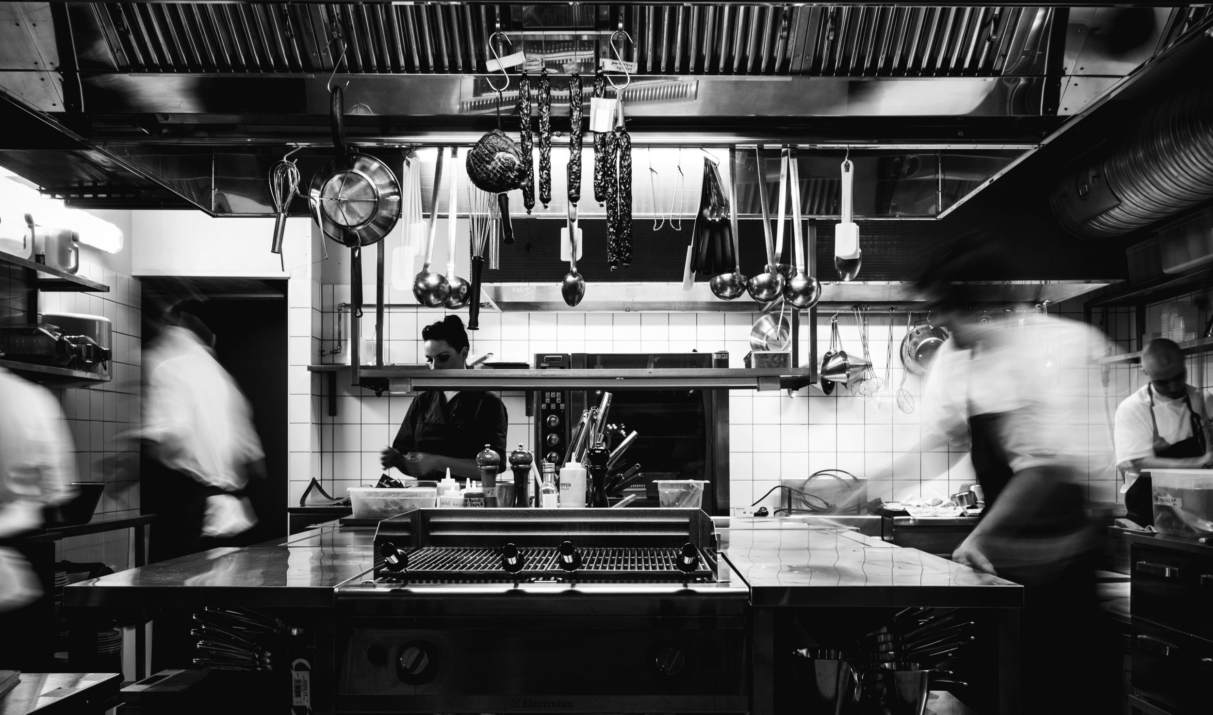 A busy kitchen scene at Restoran O, an eatery that is Estonian to the core