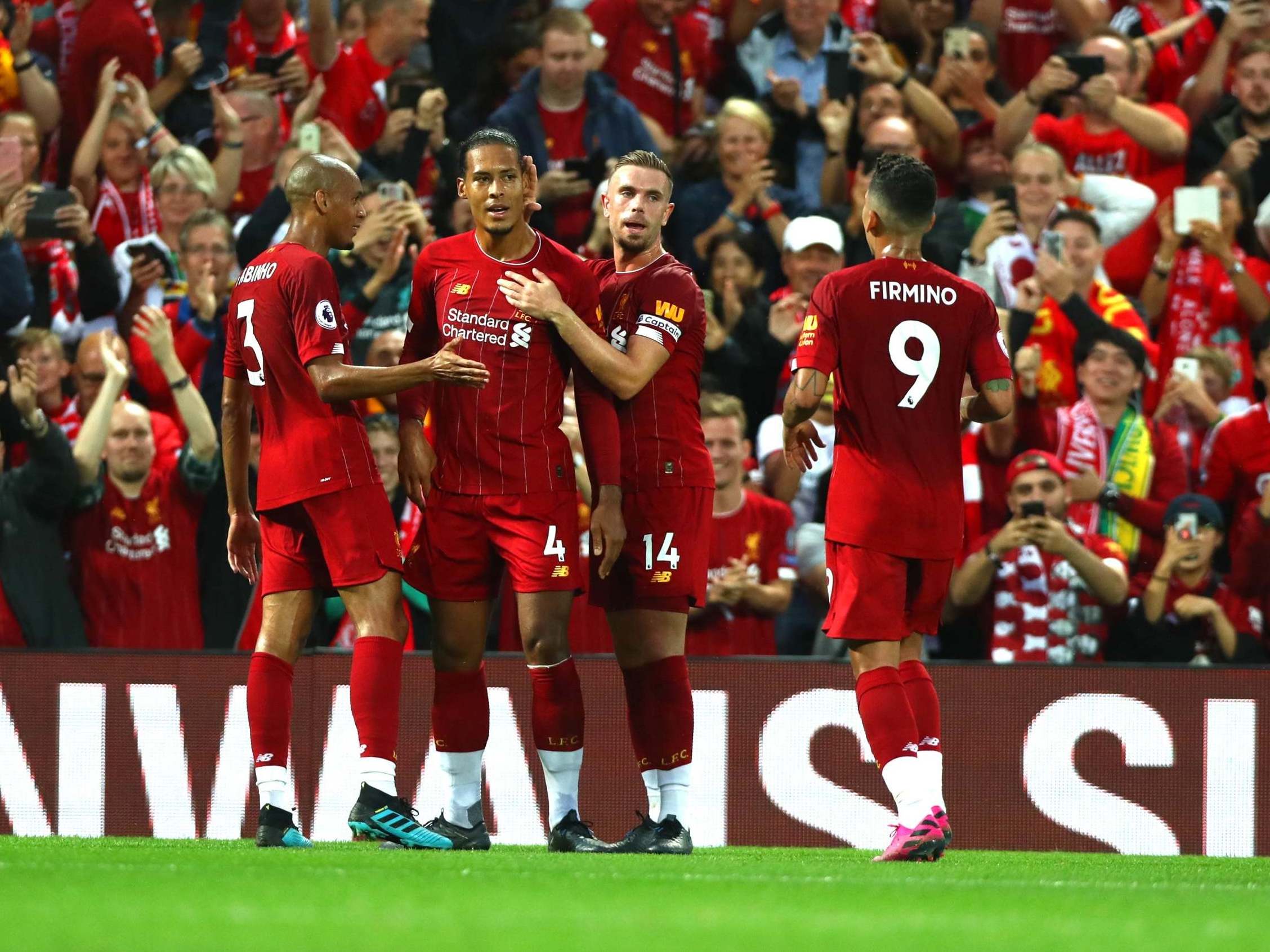 Virgil van Dijk celebrates after scoring Liverpool's third