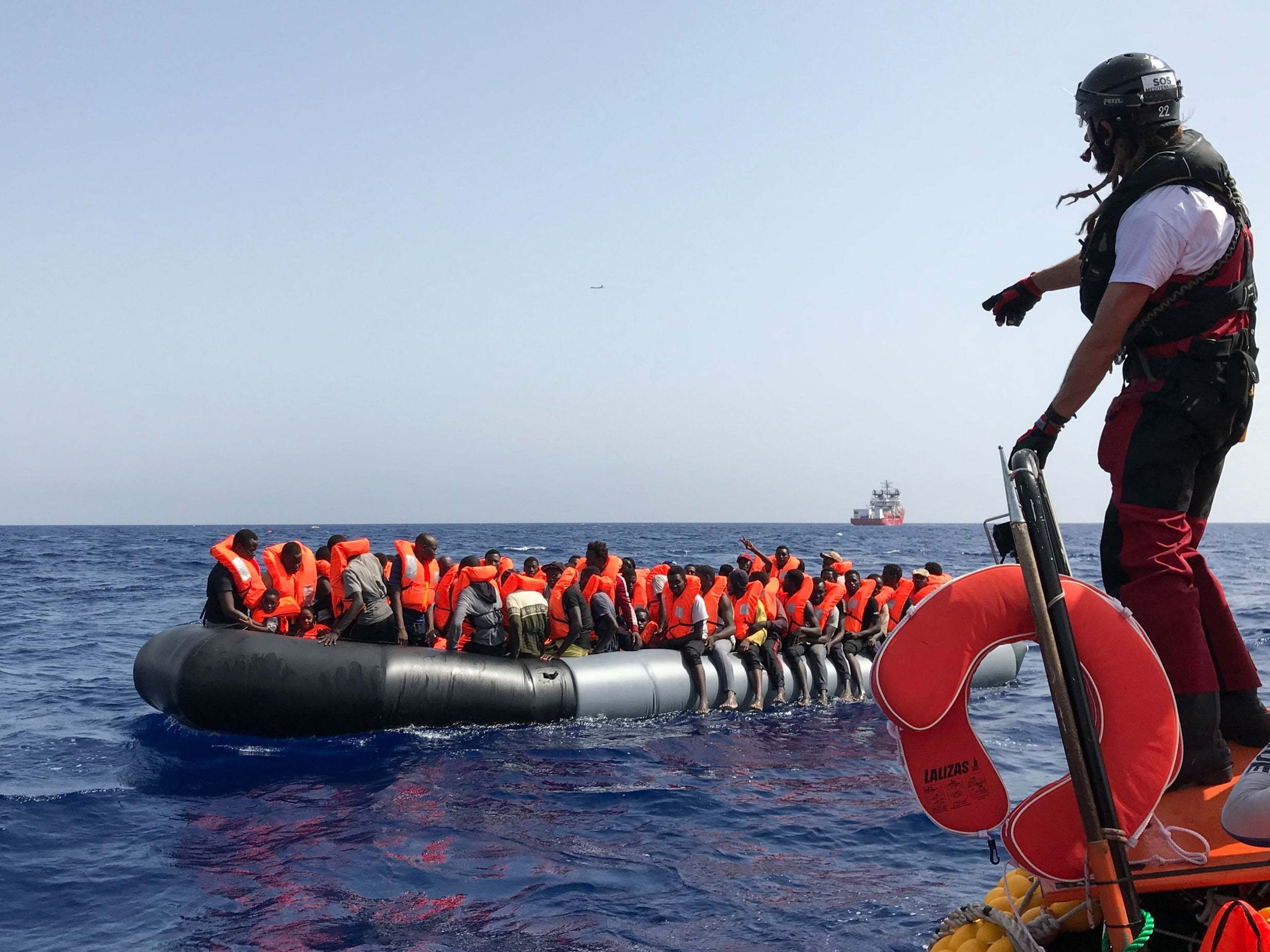 Rescue workers are standing defiant and continuing to rescue migrants making the deadly Mediterranean crossing, with a crew member from the NGO-ran Ocean Viking making a new salvage on August 9