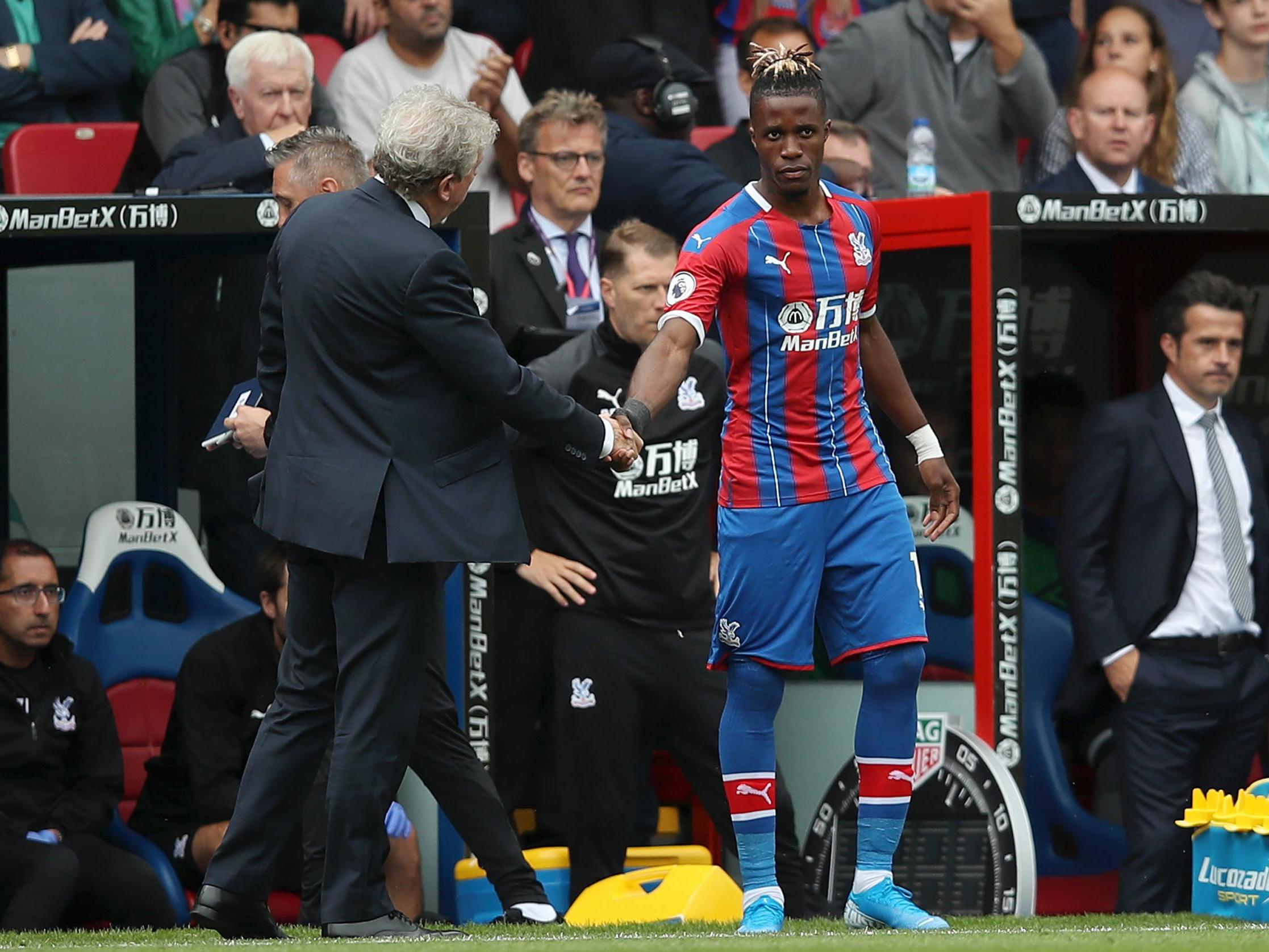 Wilfried Zaha is introduced from the bench in Palace’s opening game