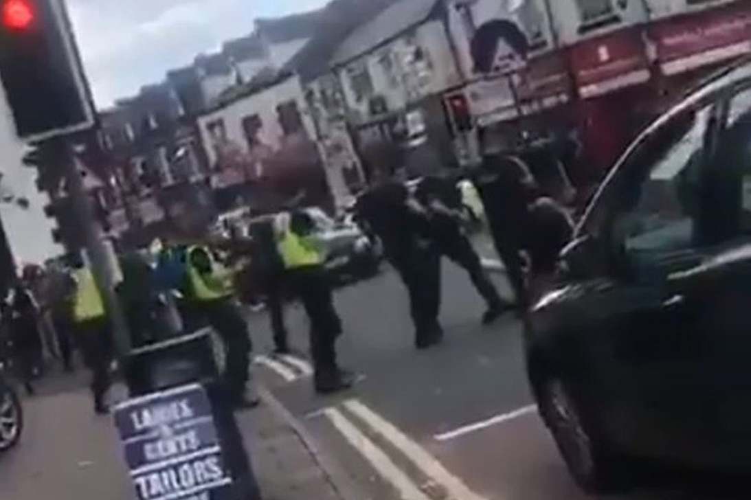 Screengrab taken from video posted on social media of a man being detained by police after an incident in Moorcroft Road, Moseley