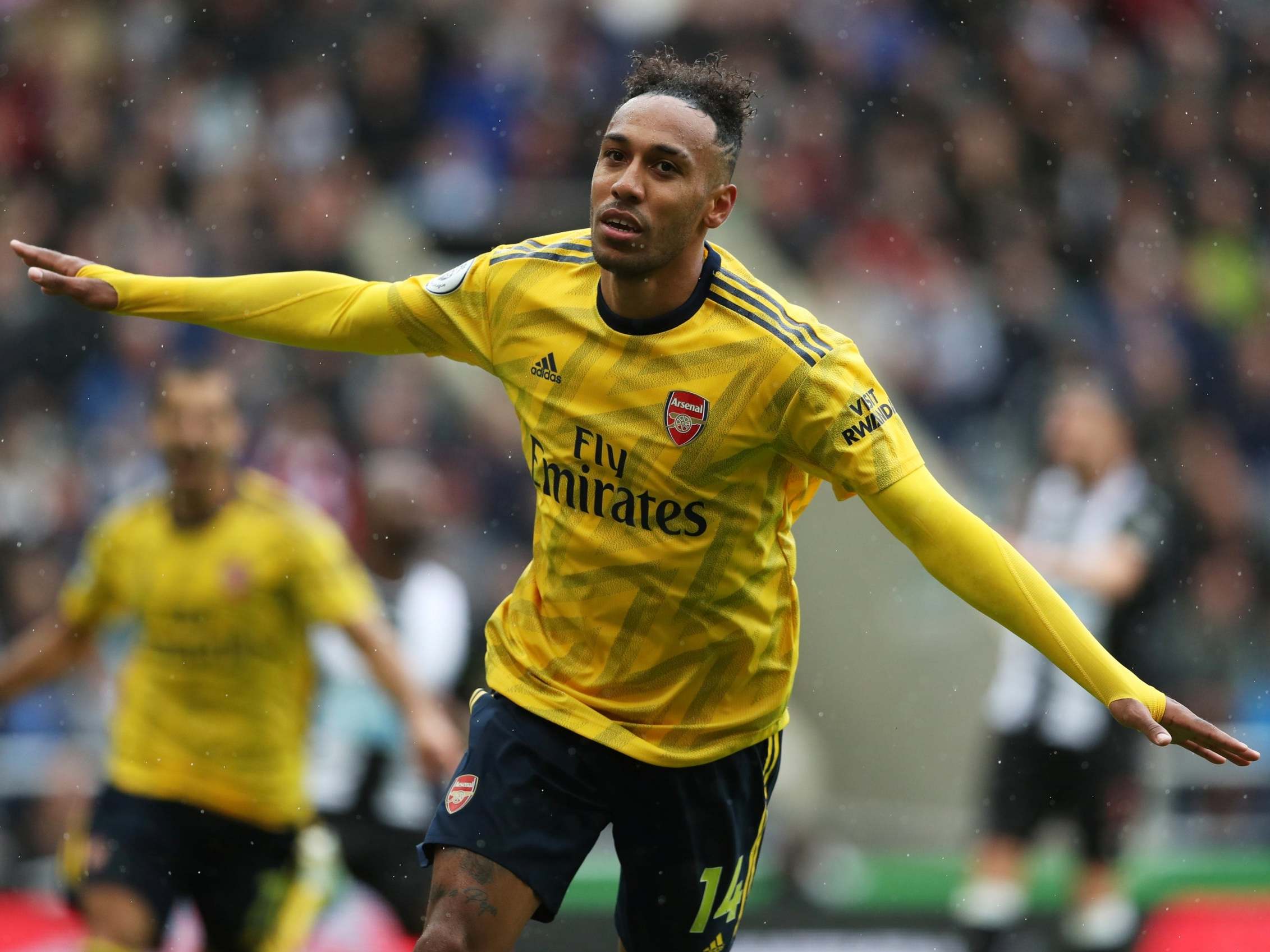 Aubameyang celebrates his goal against Newcastle