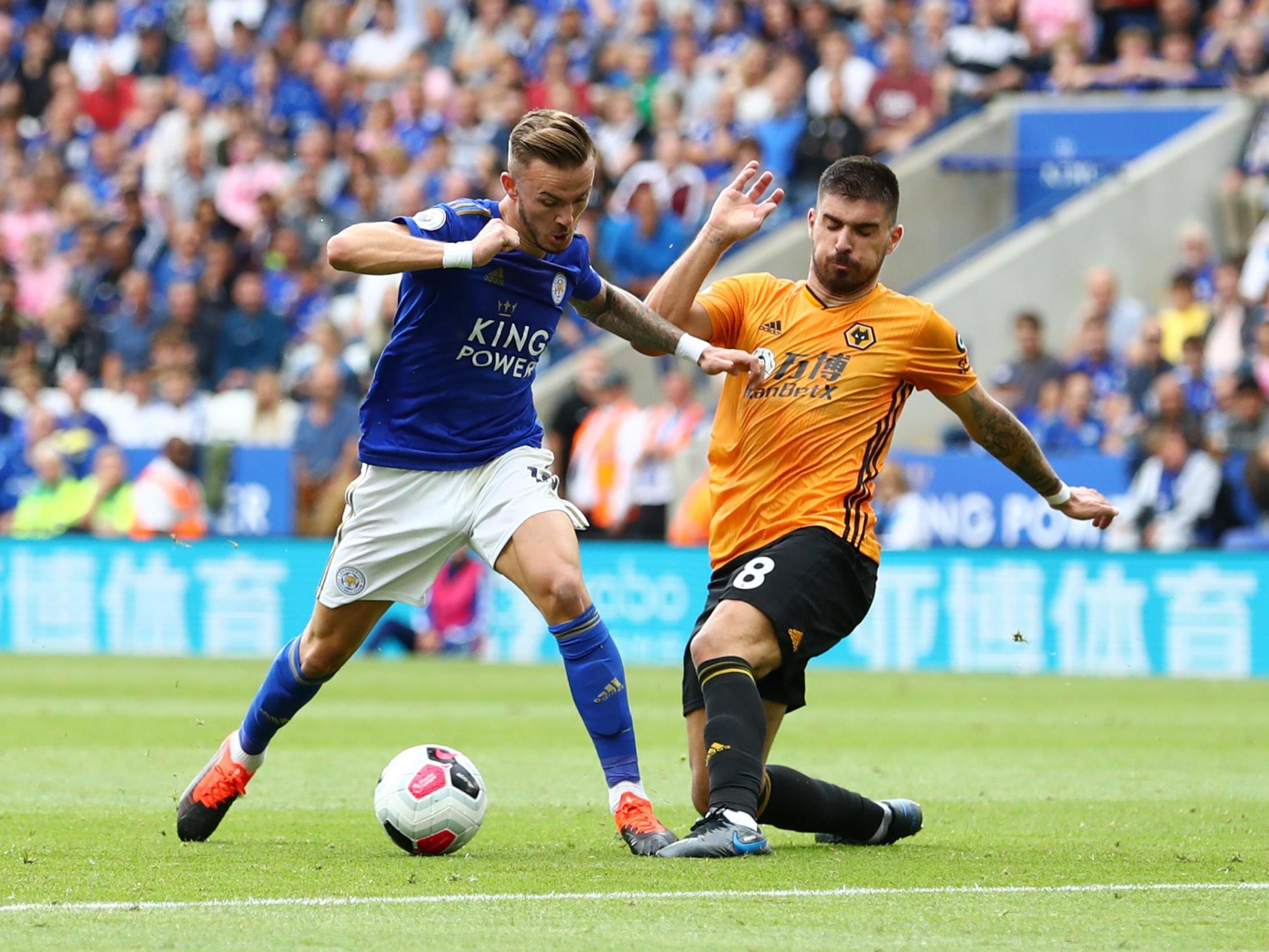 James Maddison attempts to get away from Ruben Neves