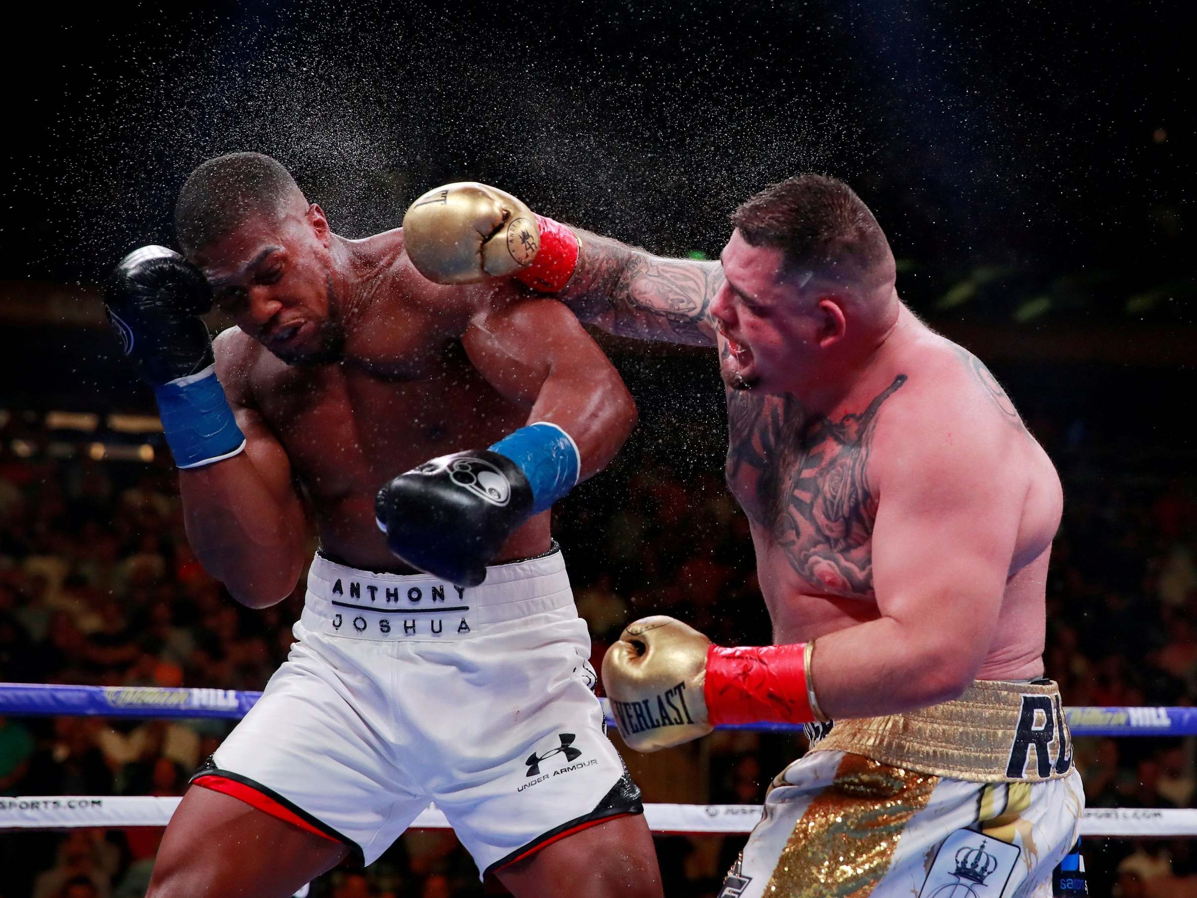 Ruiz Jr lands on Joshua on his way to a stunning victory