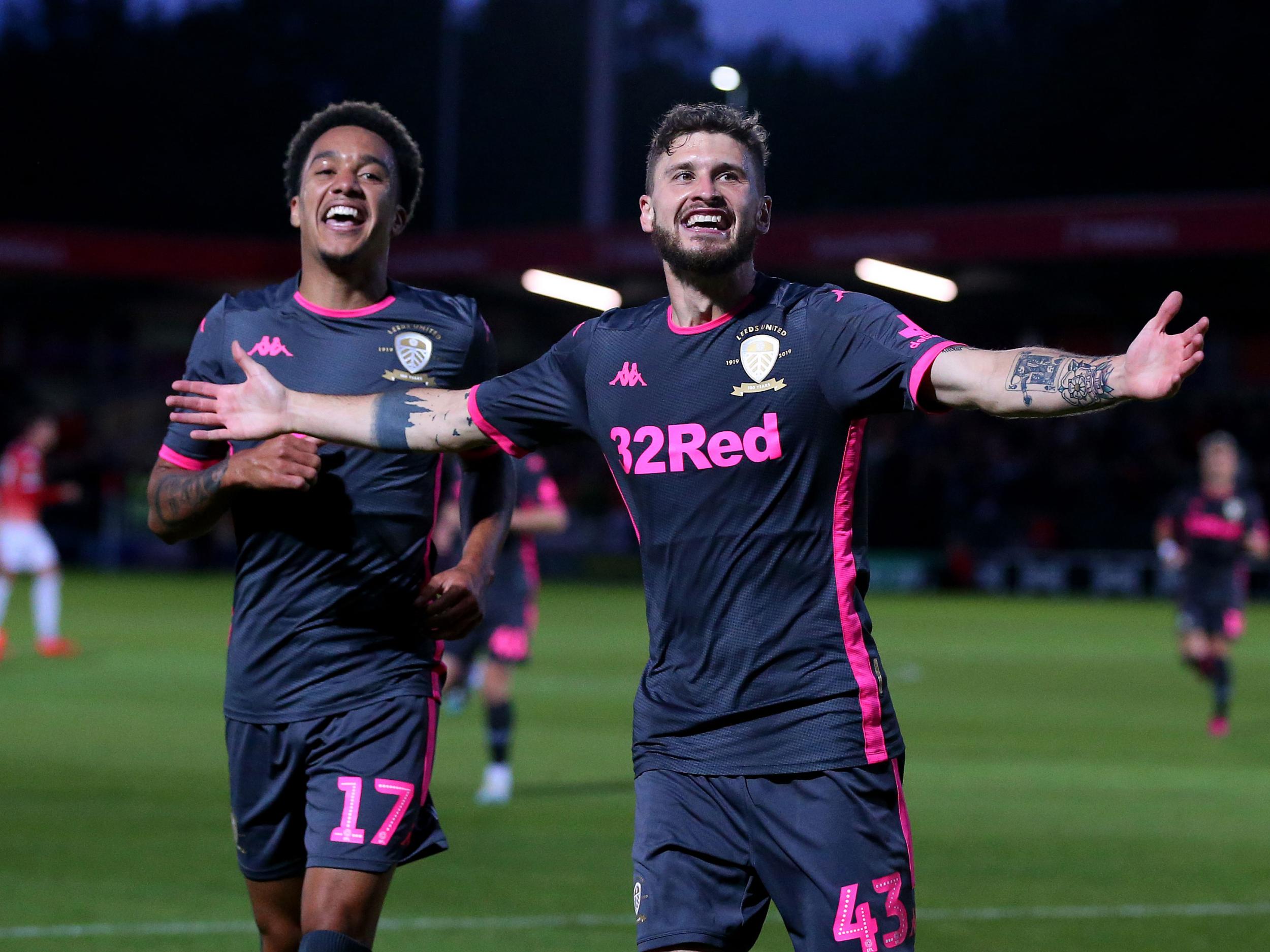 Mateusz Klich celebrates scoring Leeds' third and final goal