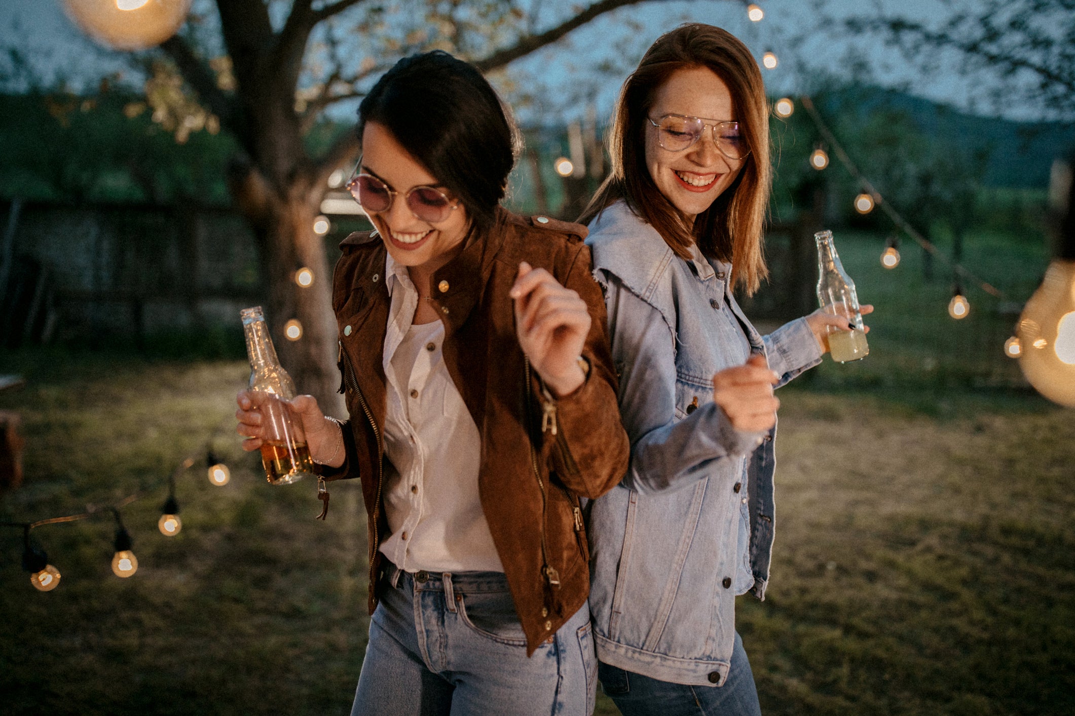 Friends dancing in the garden