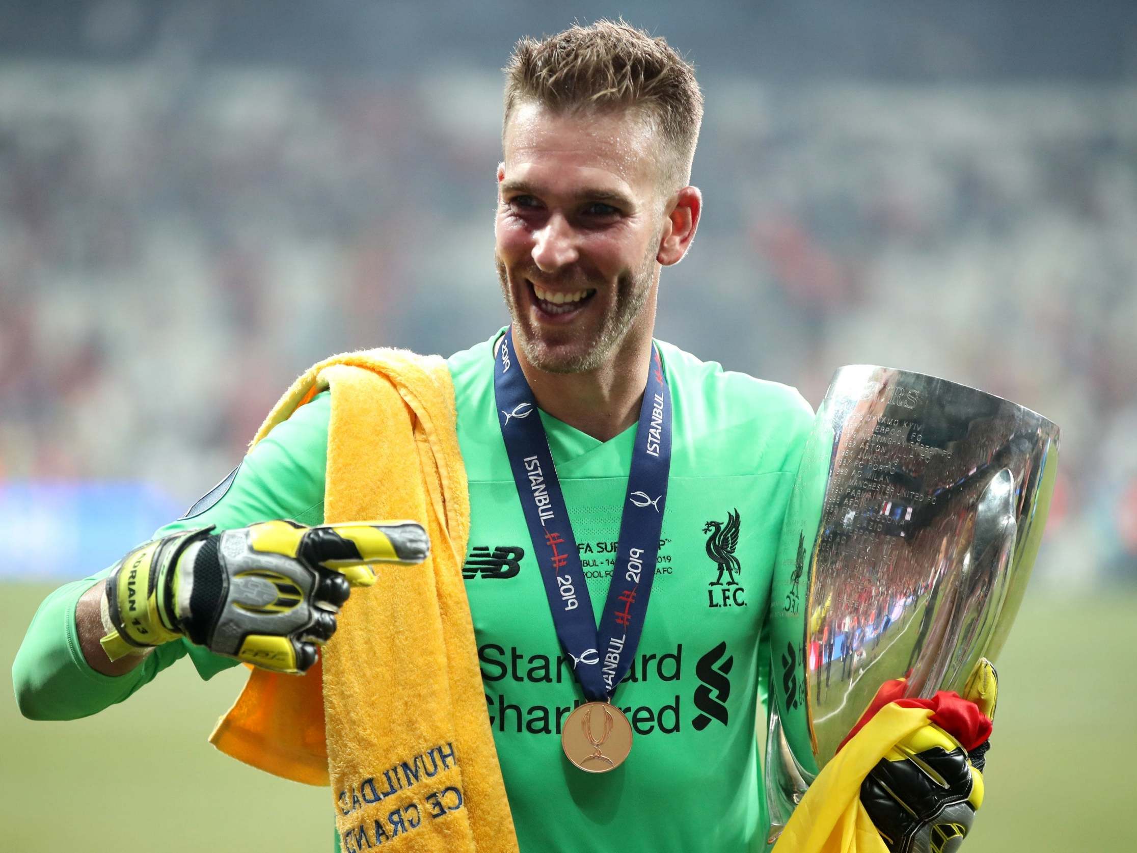 Adrian celebrates after helping Liverpool to win the Super Cup on his first start