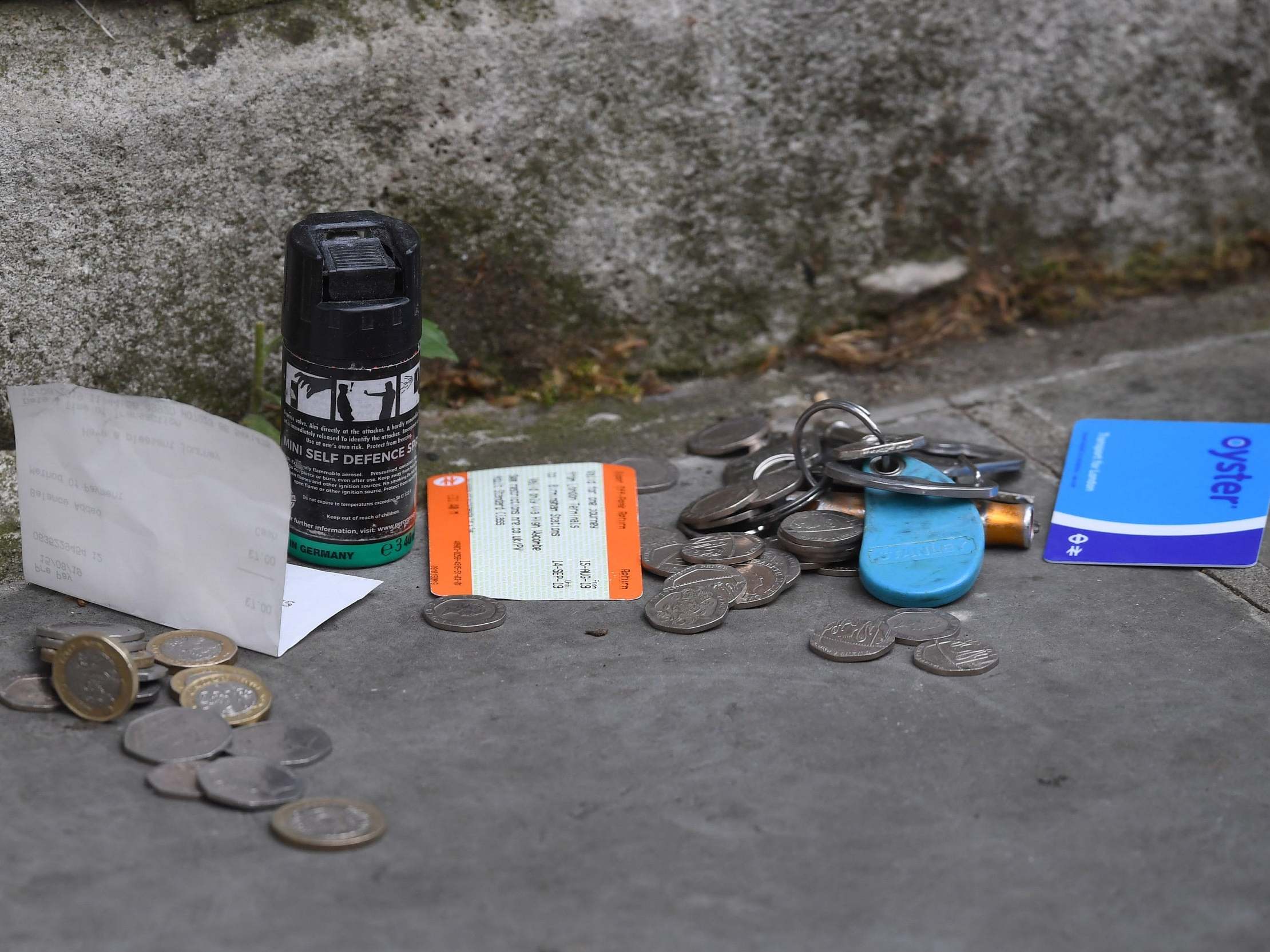 Items behind a police cordon outside St John's Smith Square church in Westminster, London after an incident in which a man was stabbed outside the Home Office