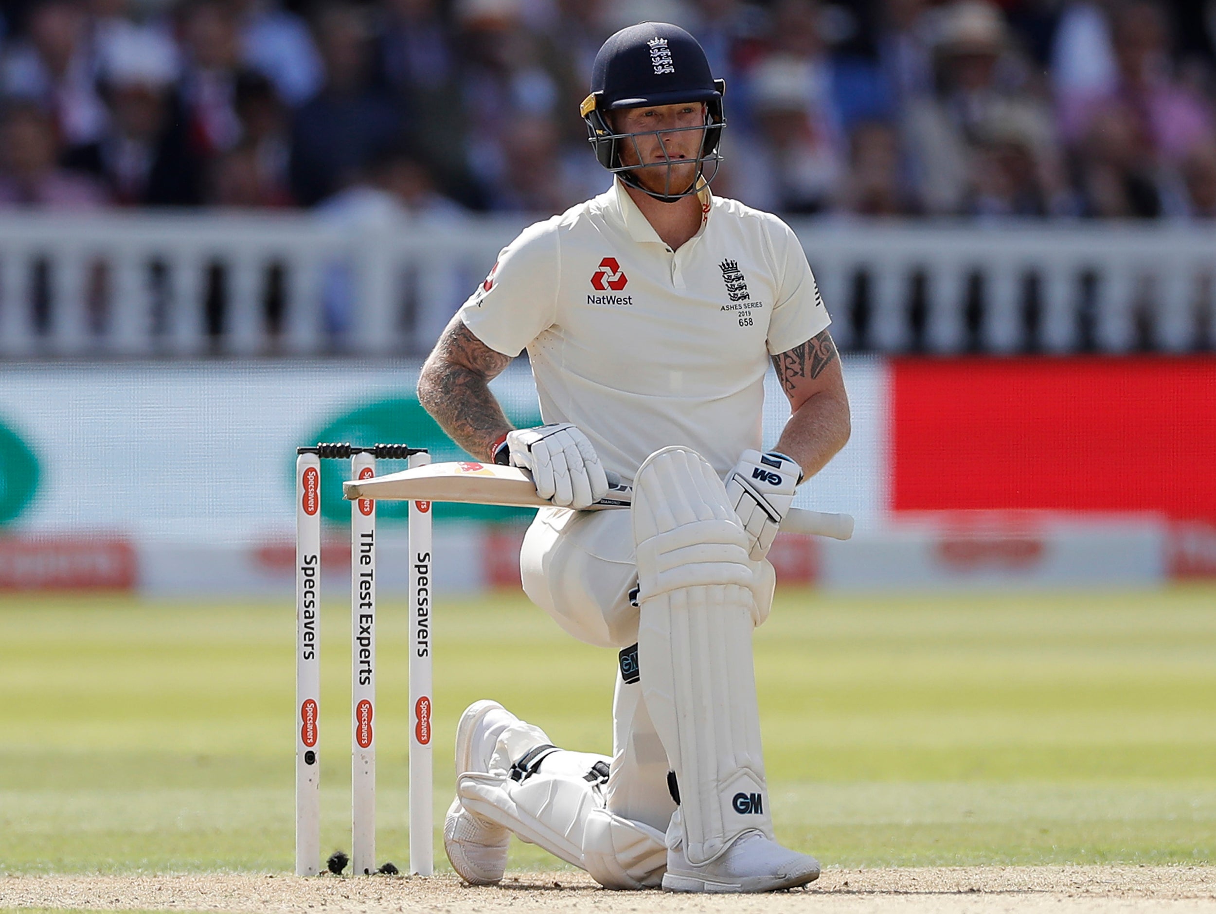 Ben Stokes looks nervously at the umpire