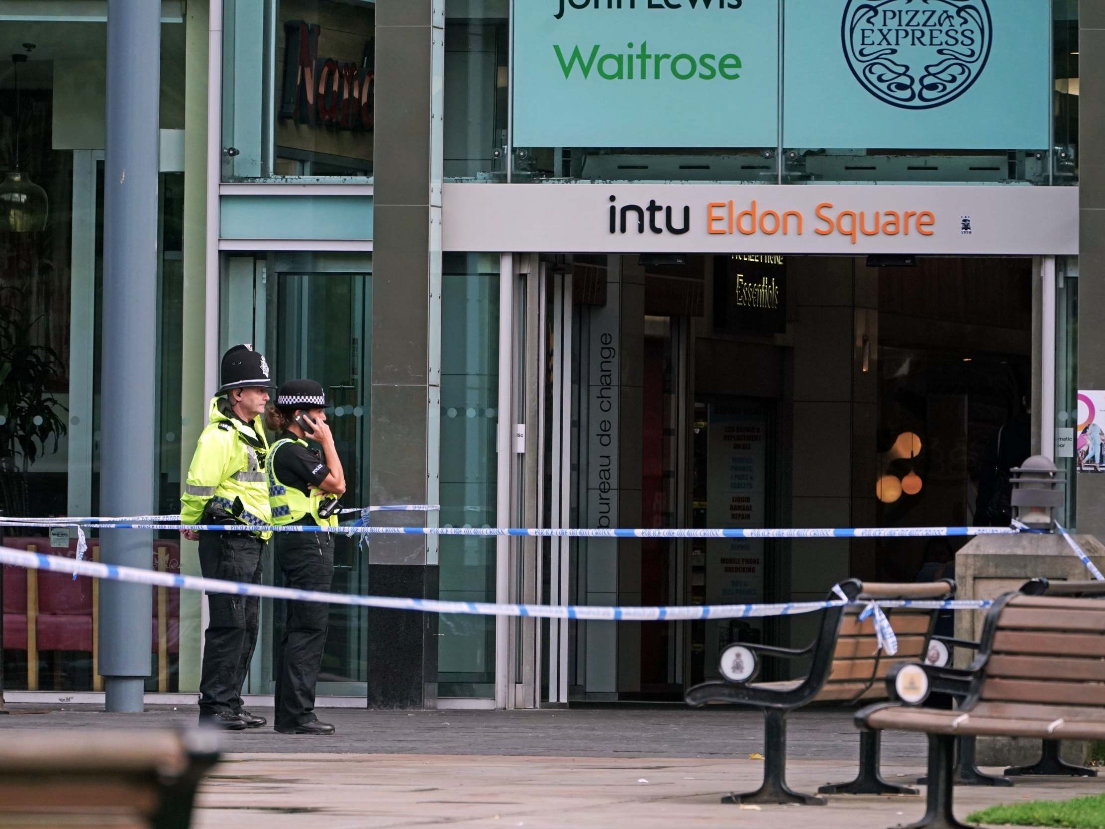 Police officers outside a branch of Greggs near Old Eldon Square, Newcastle, where a 52-year-old man was stabbed and later died in hospital