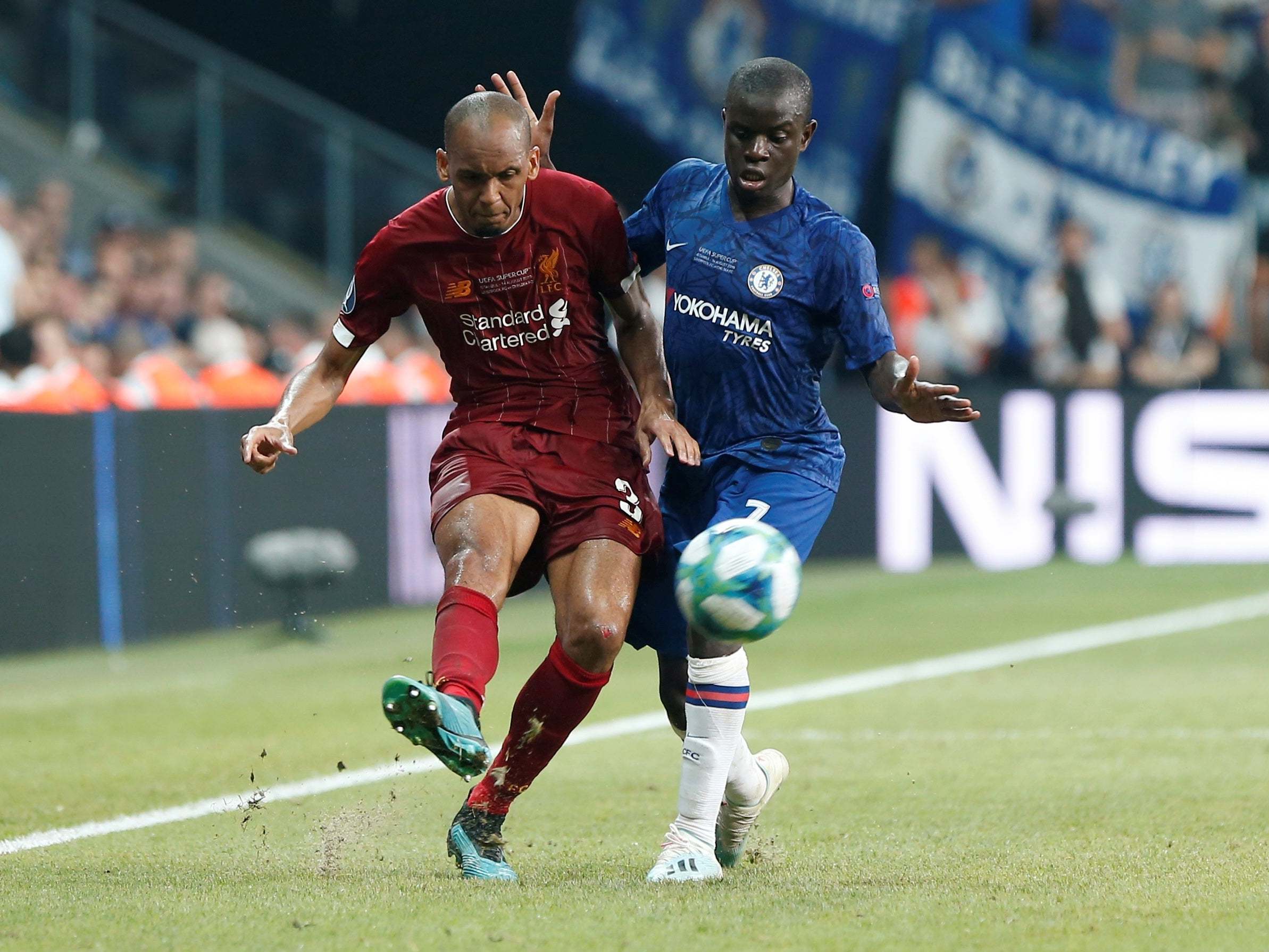 Fabinho is challenged by Kante