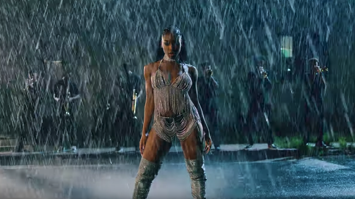 Normani wears a diamond-encrusted outfit and thigh-high boots in one scene (YouTube)