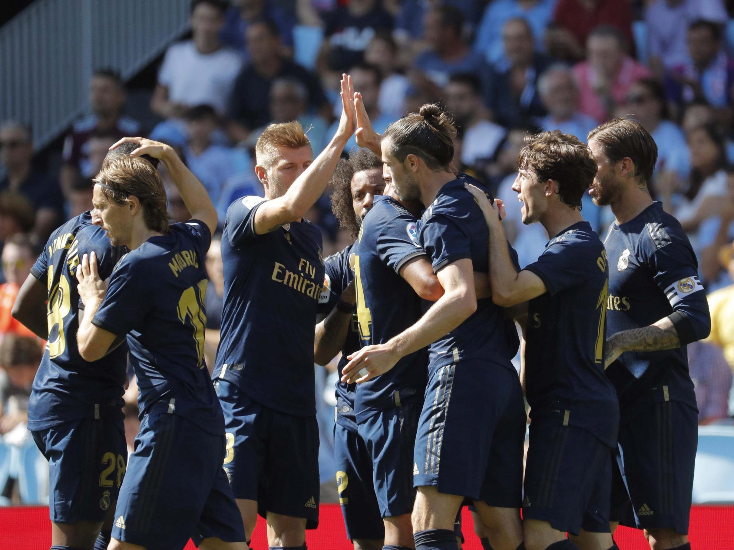 Real Madrid celebrate scoring vs Celta Vigo