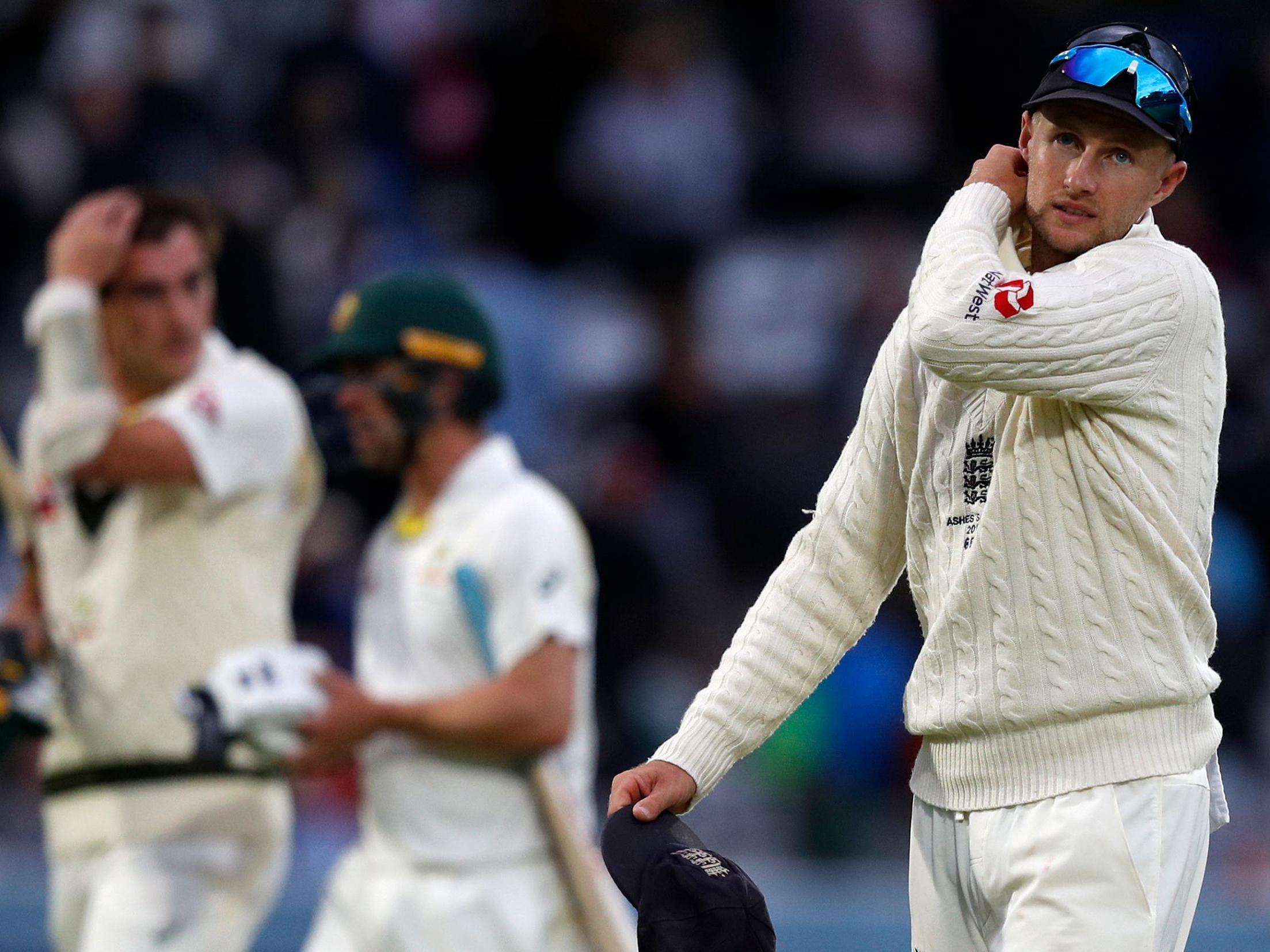 Root looks on after Australia survive