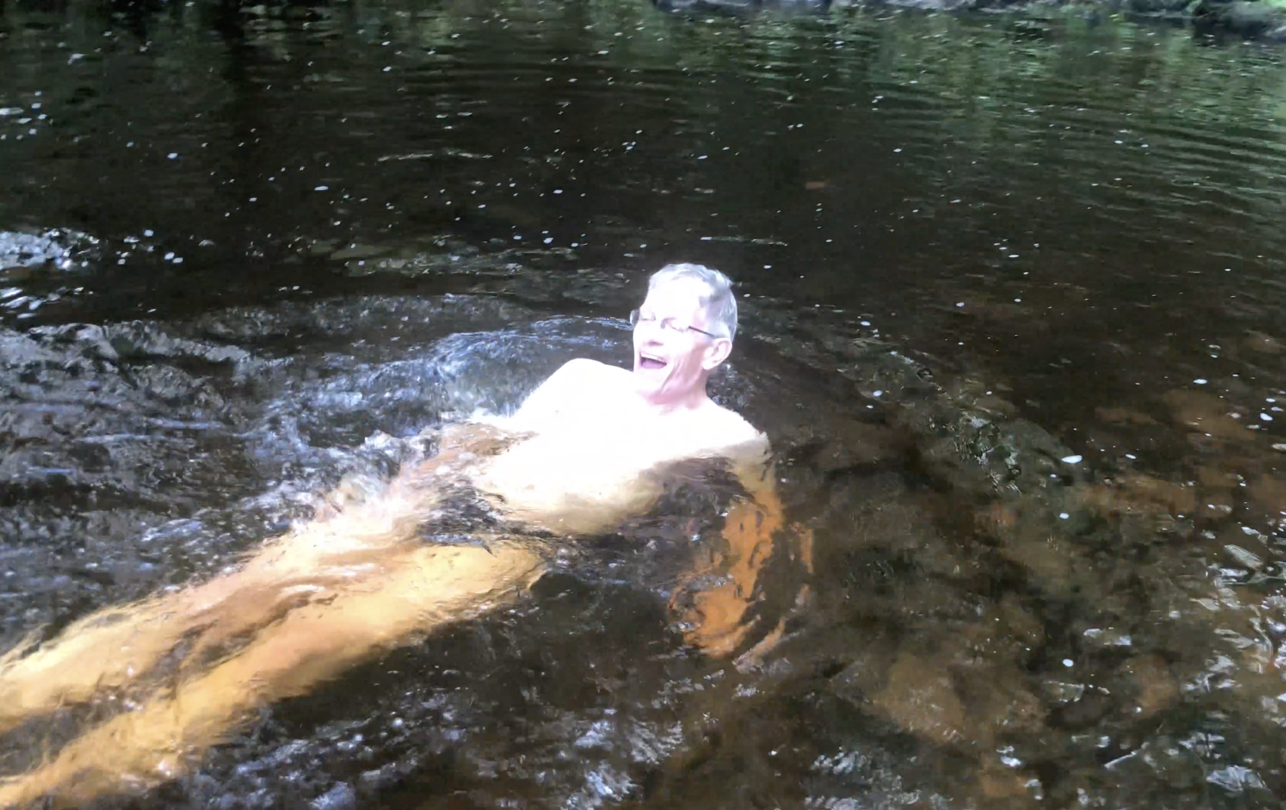 Cold front: Simon Calder swimming in the River Fowey at Golitha Falls