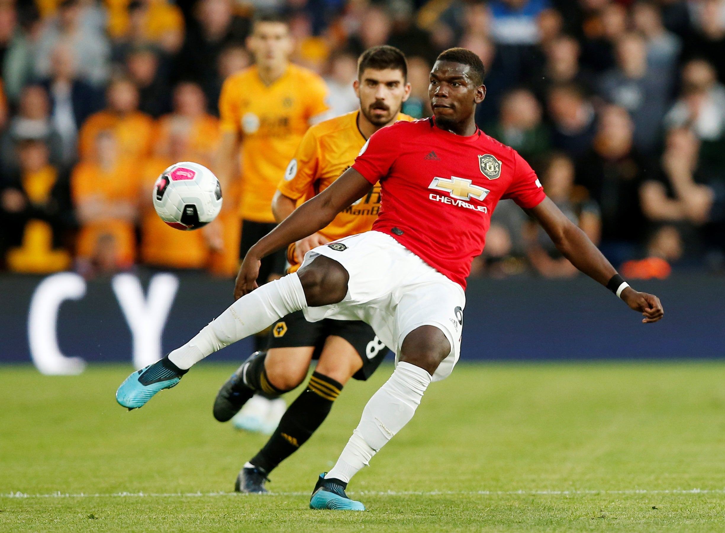 Pogba and Neves battle for possession